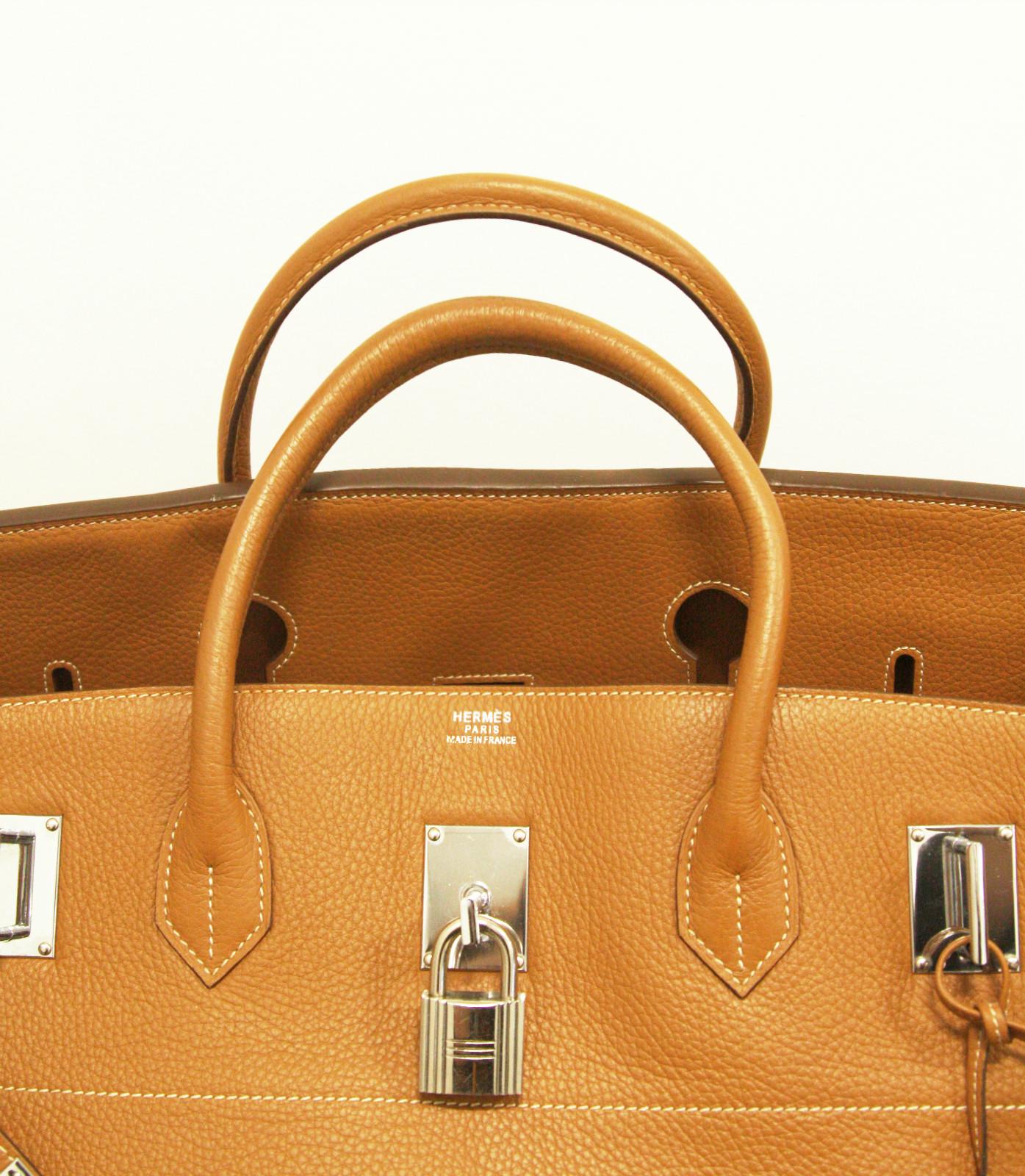 A rarely seen reimagining of the iconic Hermes Birkin, this spectacularly large HAC Birkin is a must-have piece for any lover of Hermes. In the highly sought-after shade of Gold, a caramel brown, and accented with gold-tone hardware, its subtle