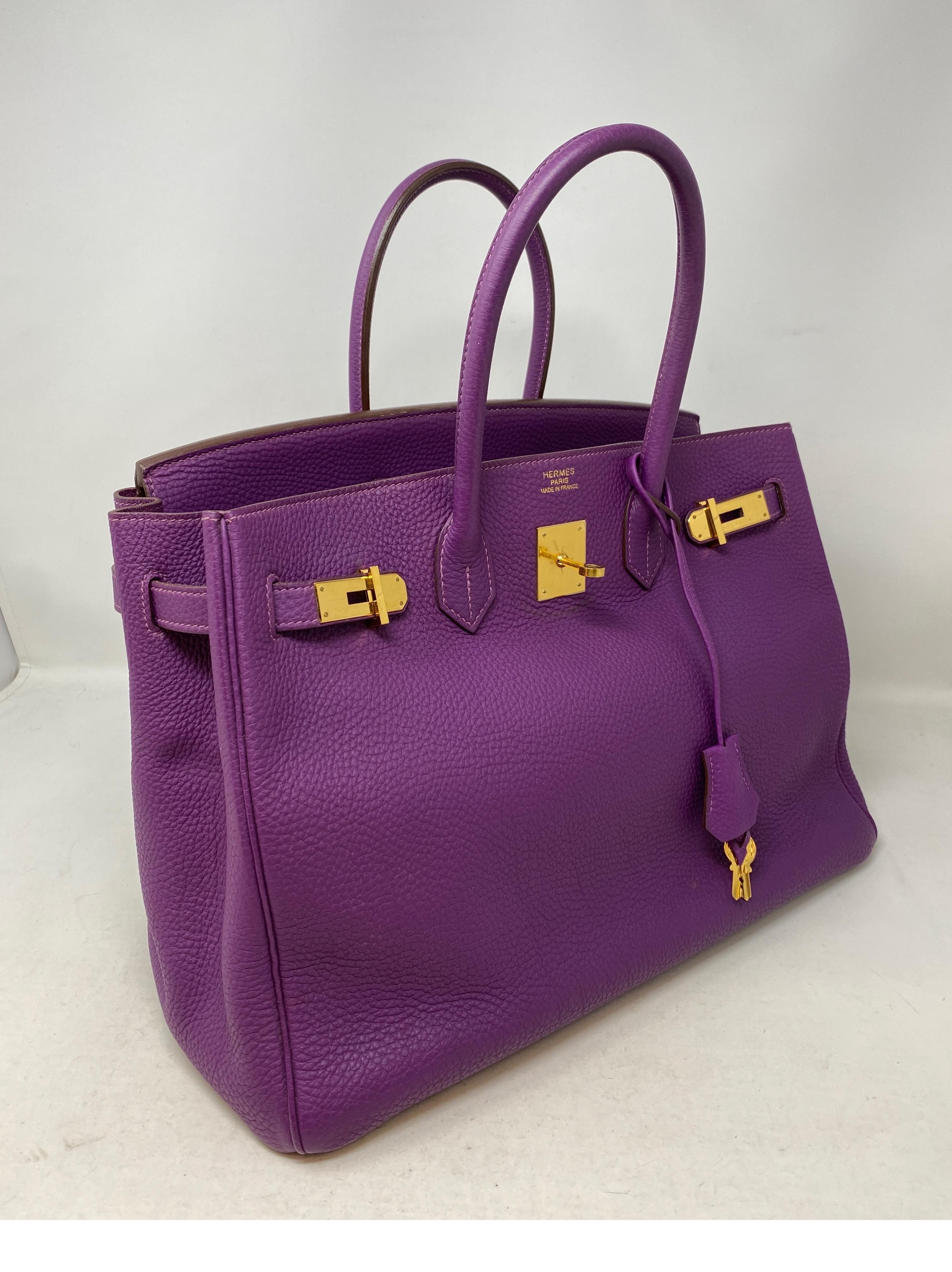 Hermes Birkin Anemone 35 Bag. Nice purple color togo leather with gold hardware. Good condition. Light wear and slight slouch. Beautiful color. Includes clochette, lock, keys, and dust cover. Guaranteed authentic. 