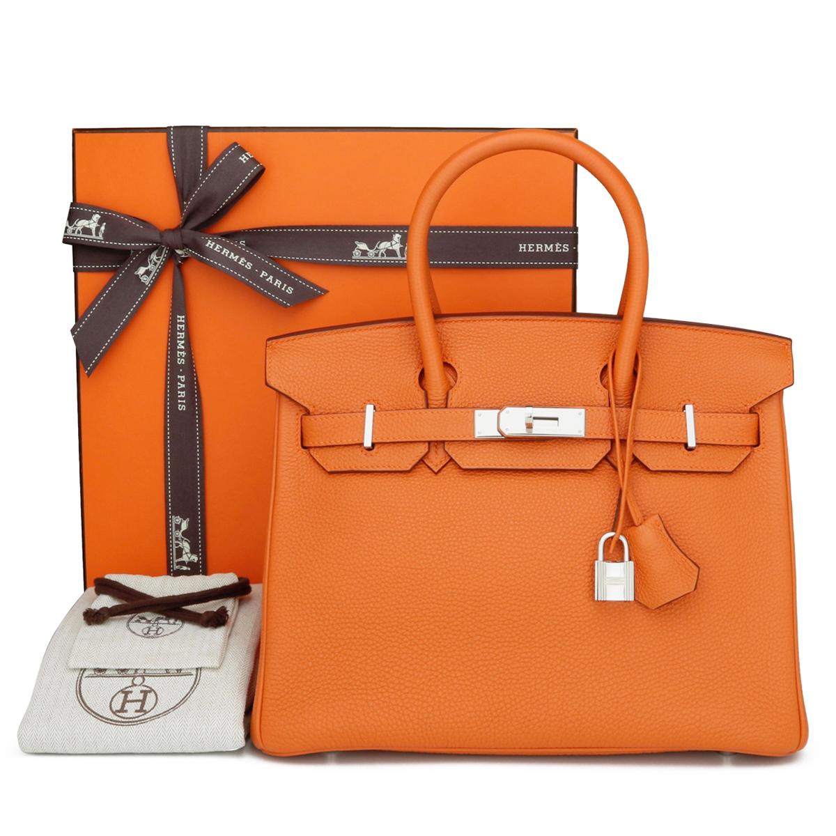 Hermès Birkin Bag 30cm Classic Orange Togo Leather with Palladium Hardware Stamp M_Year 2009.

This bag is still in excellent condition. The leather still smells fresh and retains its original shape. The hardware is still very shiny.

A truly