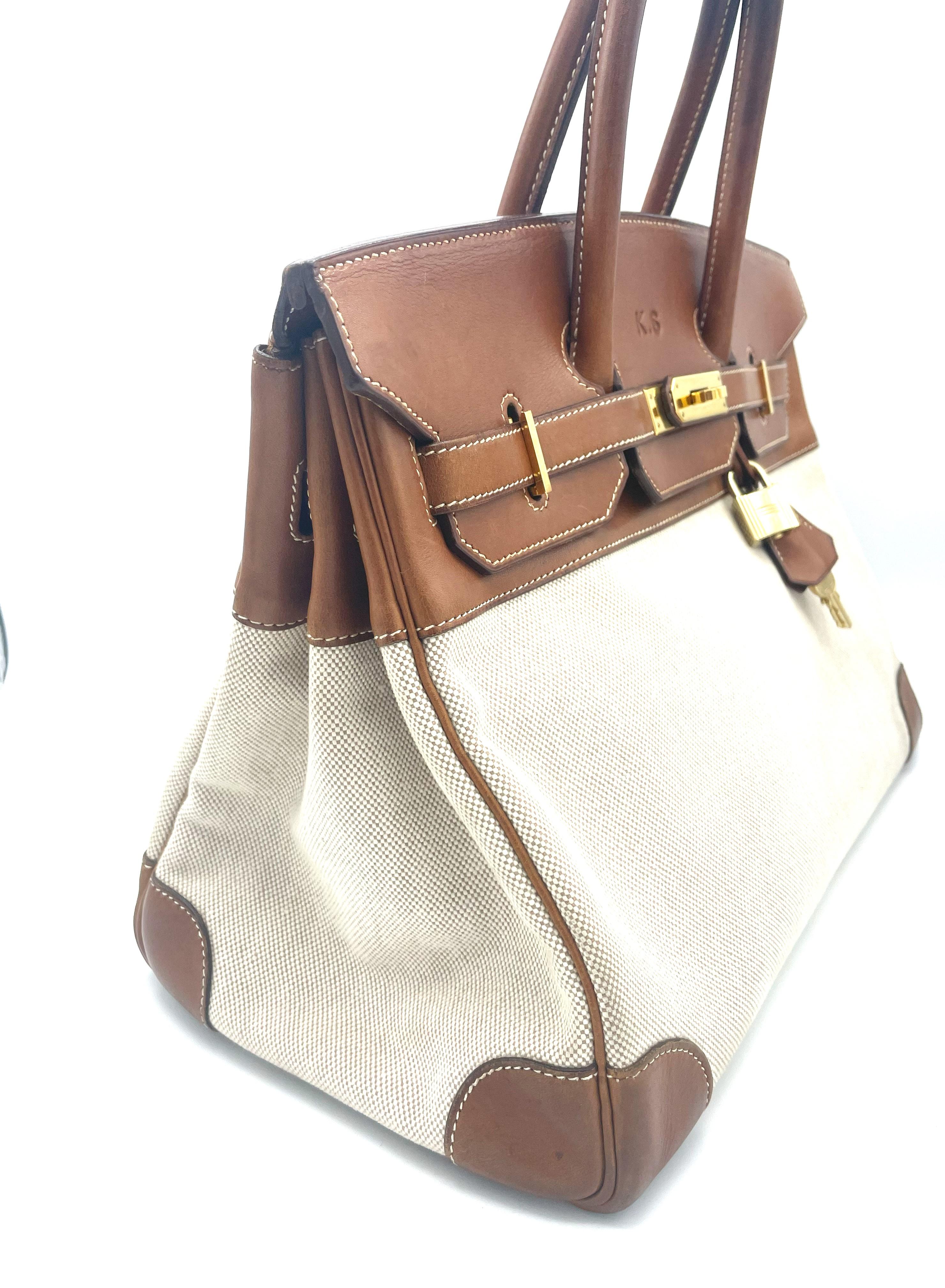 Iconic Hermès Birkin bag 35 cm (Made in France) made of wonderful Barenia leather and canvas.  
A bag personalized with K.S. !   perhaps  KNECHT SUZIE
 
Size:  
Height   26 cm
Width     33 cm
Deep      19 cm  
Features
- Original Hermés bag with Z