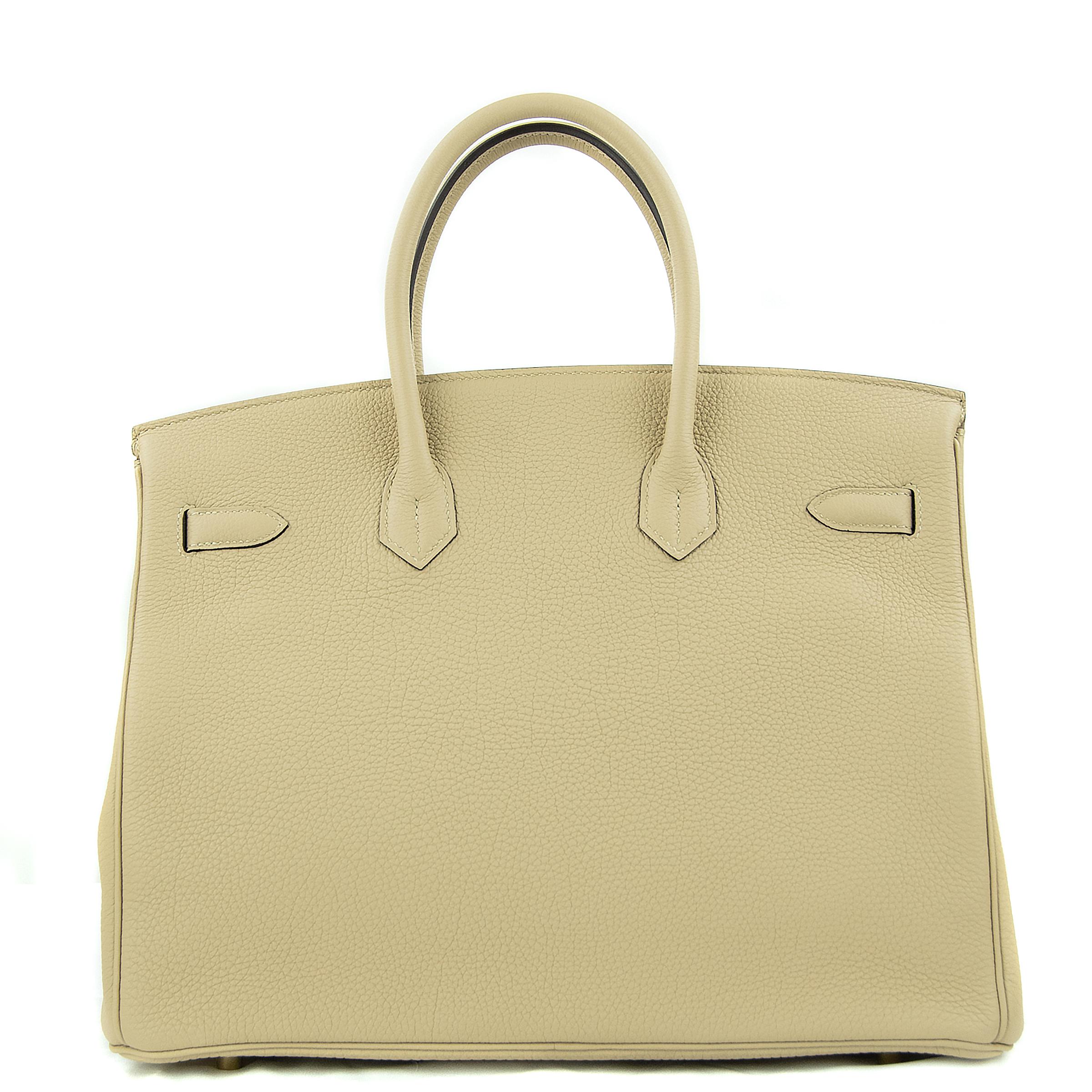 Hermes 35cm Birkin bag in Argile Togo. This iconic special order Hermes Birkin bag is timeless and chic. Fresh and crisp with gold hardware.

    Condition: New or Never Used
    Made in France
    Bag Measures: 35cm (13.8