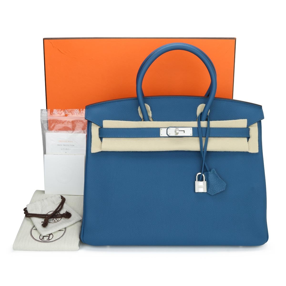 Hermès Birkin Bag 35cm Bleu de Galice Togo Leather with Palladium Hardware Stamp Q_Year 2013.

This bag is still in never worn condition. The leather still smells fresh as when new, and it still holds to the original shape. The hardware is still