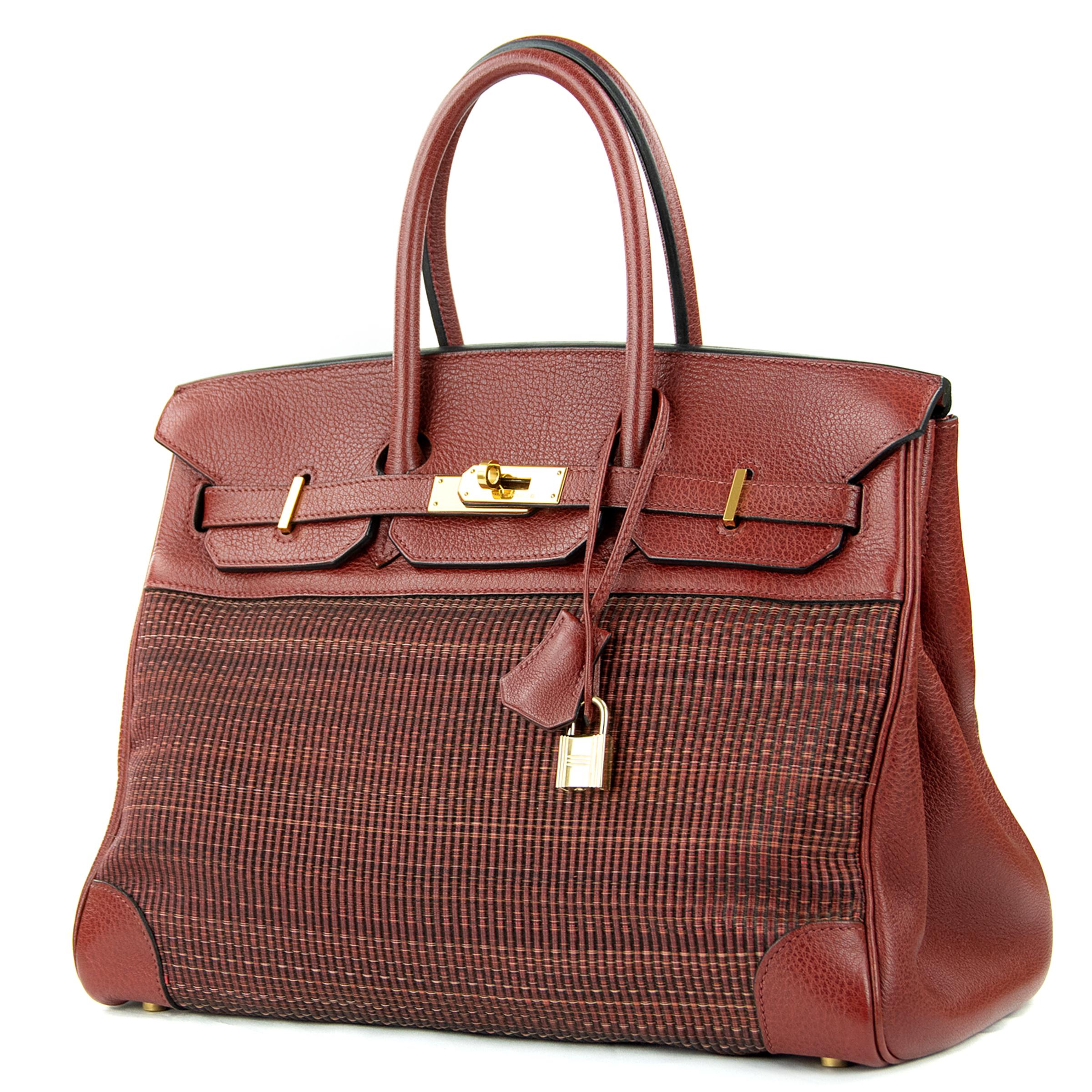 Extremely rare Hermes 35cm Birkin bag in Rouge H Buffalo Crinoline. This iconic special order Hermes Birkin bag is timeless and chic. Fresh and crisp with gold hardware.

    Condition: Excellent, Previously Used
    Made in France
    Bag Measures: