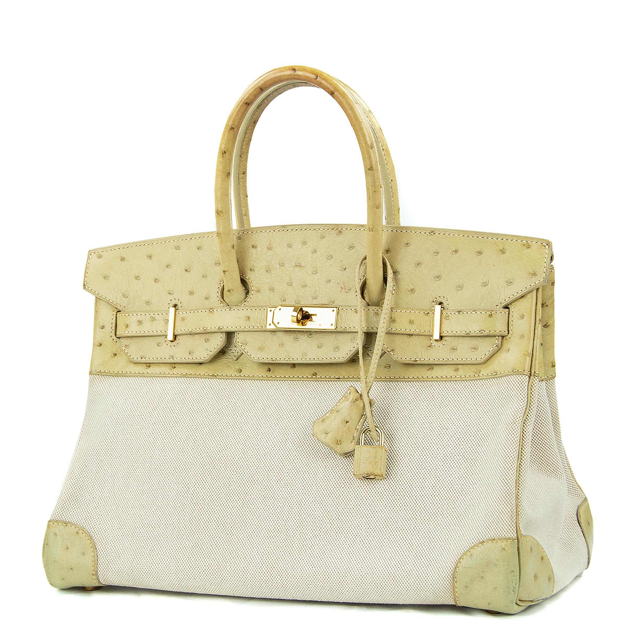 Hermes 35cm Birkin in Toile & Blanc Casse Ostrich. This iconic special order Hermes Birkin bag is timeless and chic. Fresh and crisp with gold hardware.

    Condition: Excellent, Previously Owned
    Made in France
    Bag Measures: 35cm (13.8