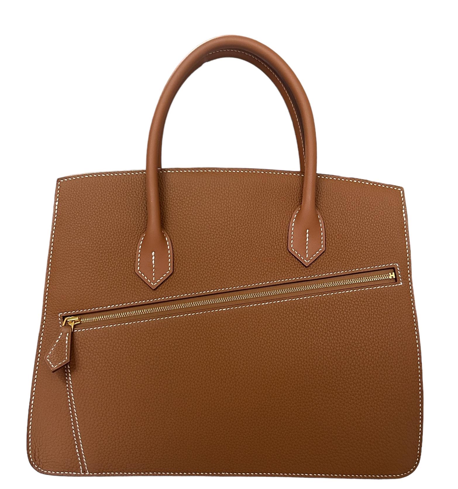 Introducing the Very Limited Desordre Sellier Birkin Bag
This limited edition  Desordre Birkin Sellier is in gold Togo and Swift leather with gold hardware and has contrast stitching, distorted flaps with turnlock closures,  exterior flap pocket and