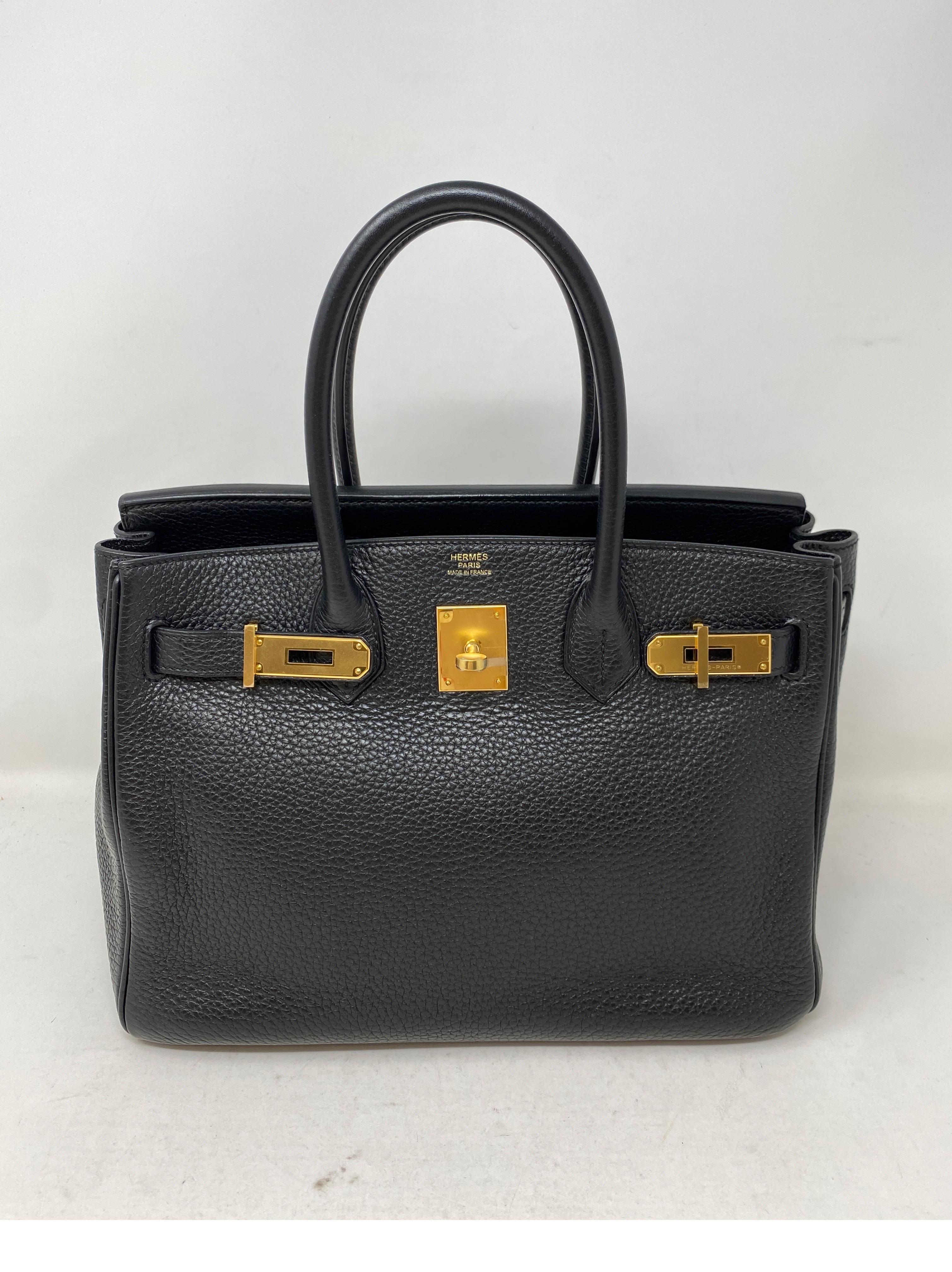 Hermes Birkin 30 Black Bag. Clemence leather. Gold hardware. Excellent looks like new condition. The most wanted and rare size 30. Plastic is still on hardware. Don't miss out on the most wanted combination. Includes clochette, lock, keys, and dust