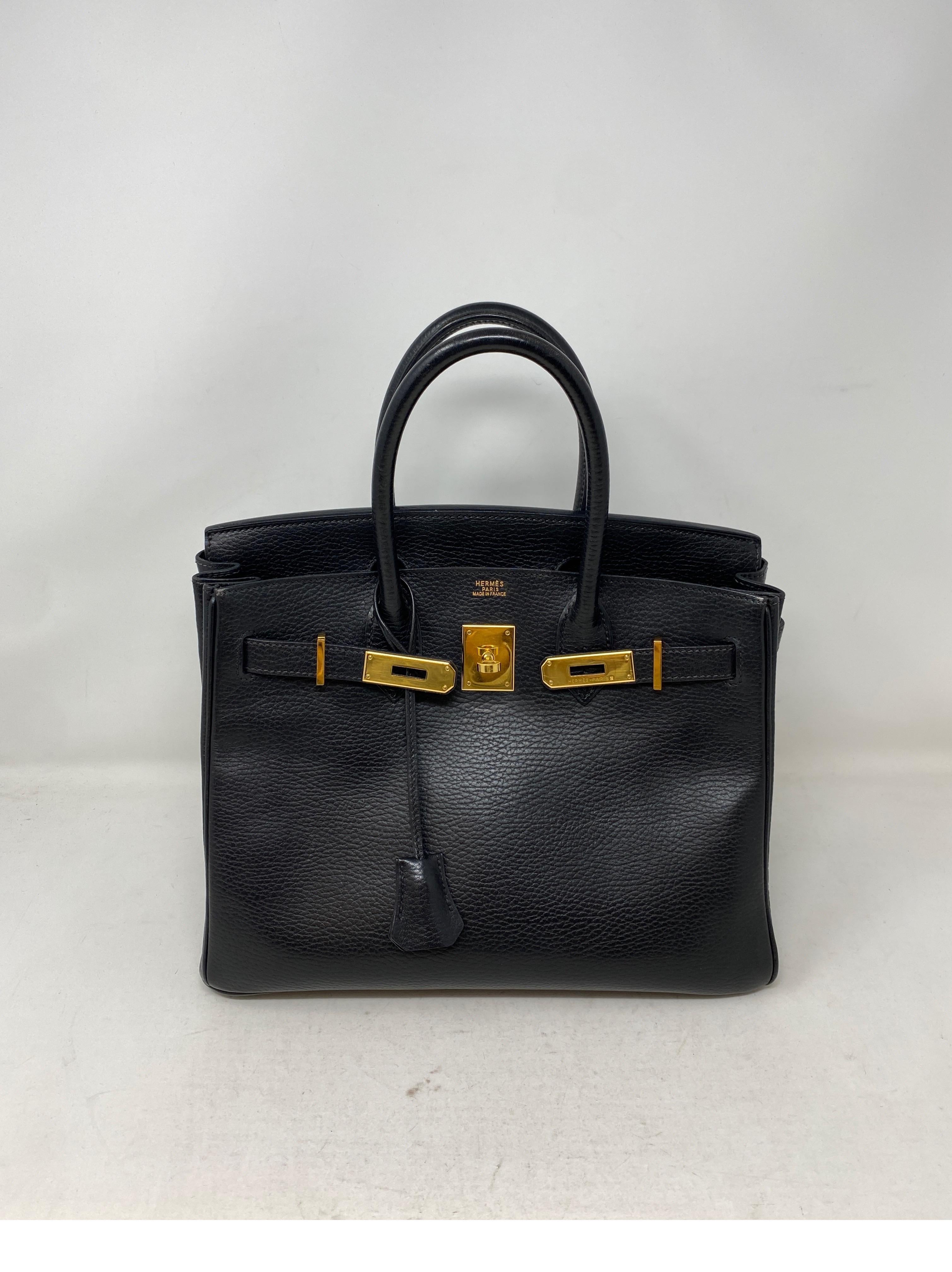 Hermes Black Birkin 30 Bag. Gold hardware. Togo leather. Highly coveted size 30 and most wanted combination. Classic bag. Includes clochette, lock, keys, and dust cover. Guaranteed authentic. 