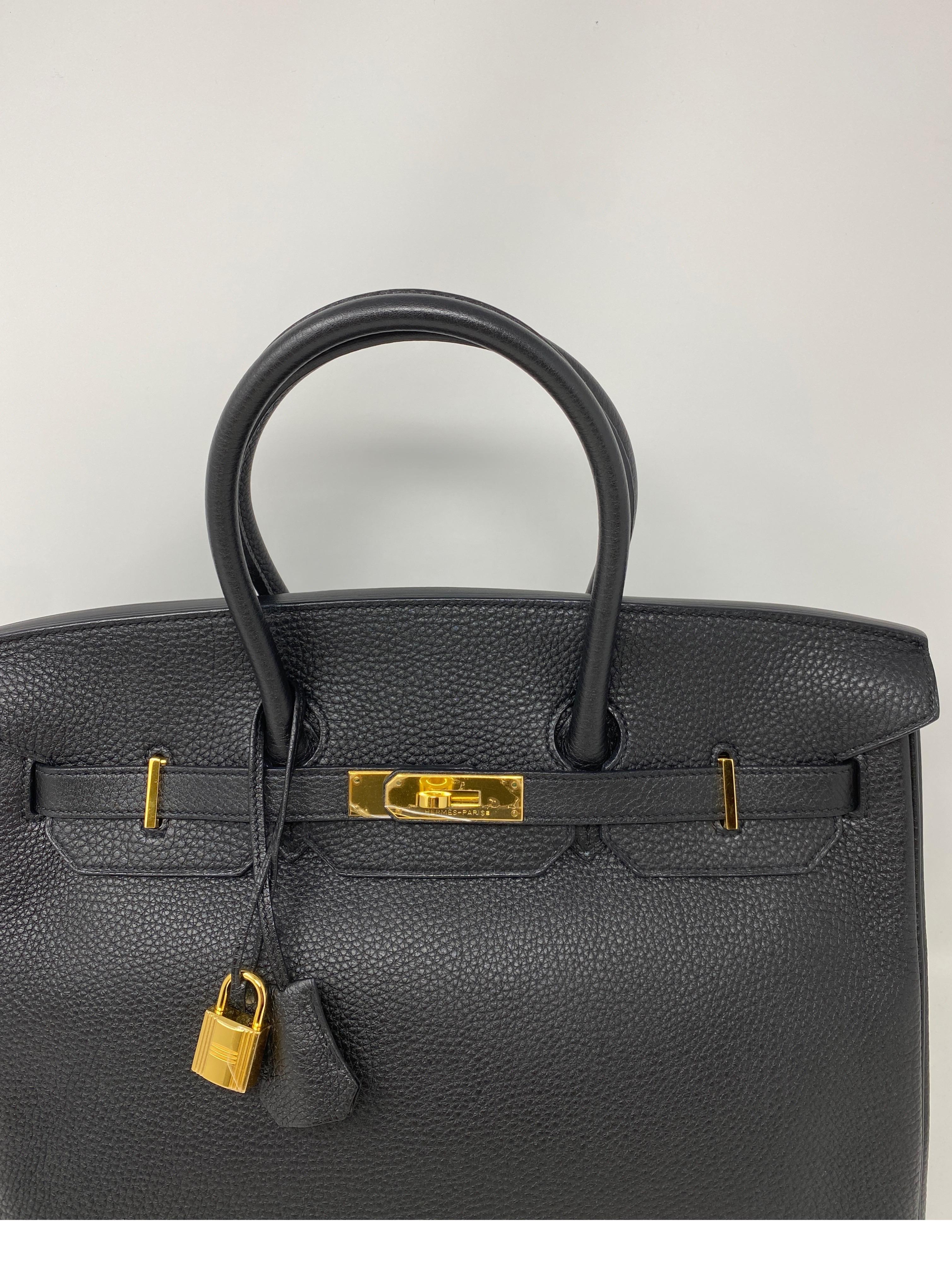 Hermes Black Birkin 35 Bag. Gold hardware. Excellent like new condition. Most wanted combo. Hard to find black and gold. From 2012. Comes with receipt and Bababebi certificate. Includes clochette, lock, keys, and dust cover. Guaranteed authentic. 