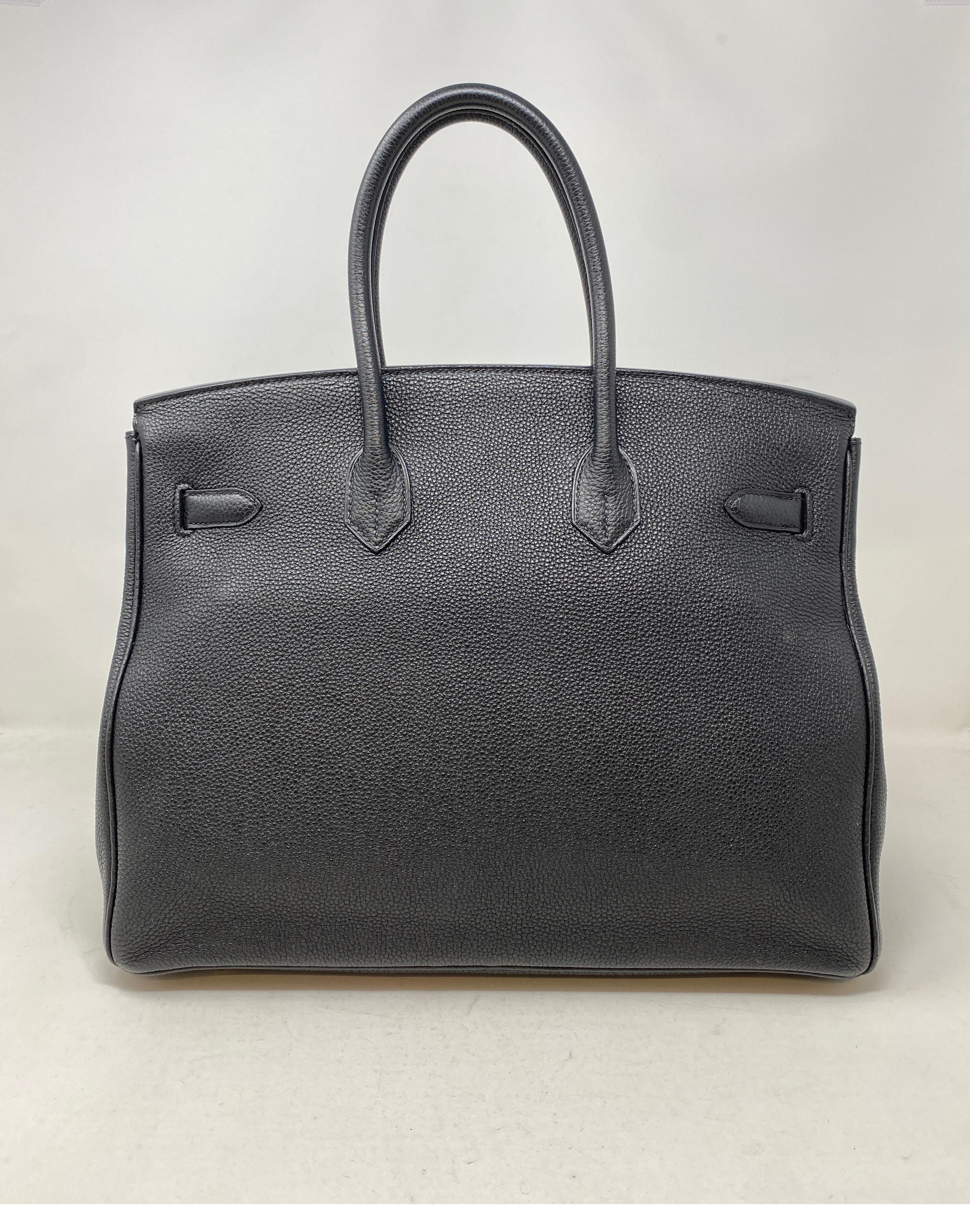 Hermes Black Birkin 35 Bag. Gold hardware. Excellent condition. Togo leather. Most wanted black with gold hardware. Classic at best. Great investment bag. Includes clochette, lock, keys, and dust cover. Guaranteed authentic. 