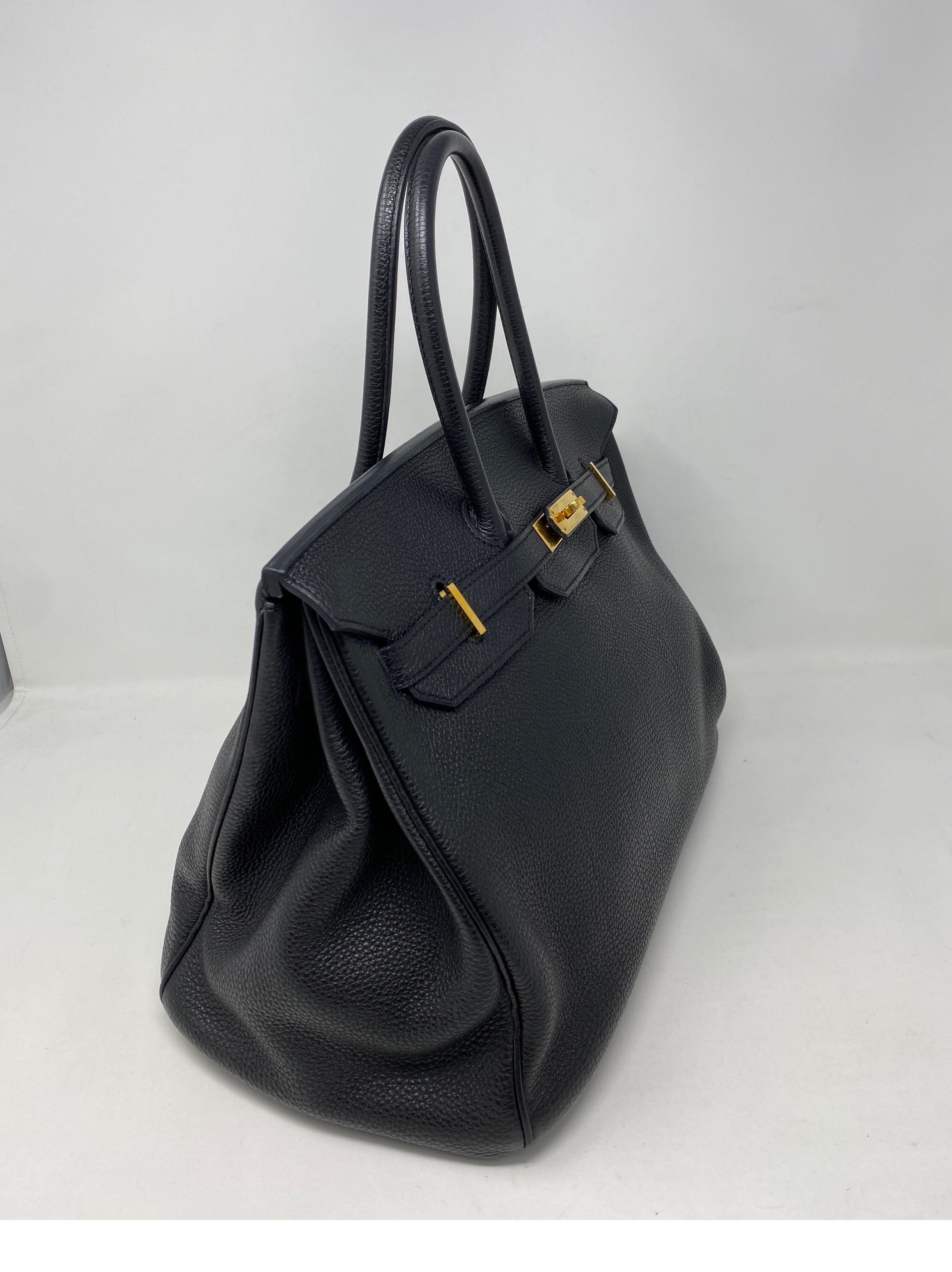 black birkin bag with gold hardware