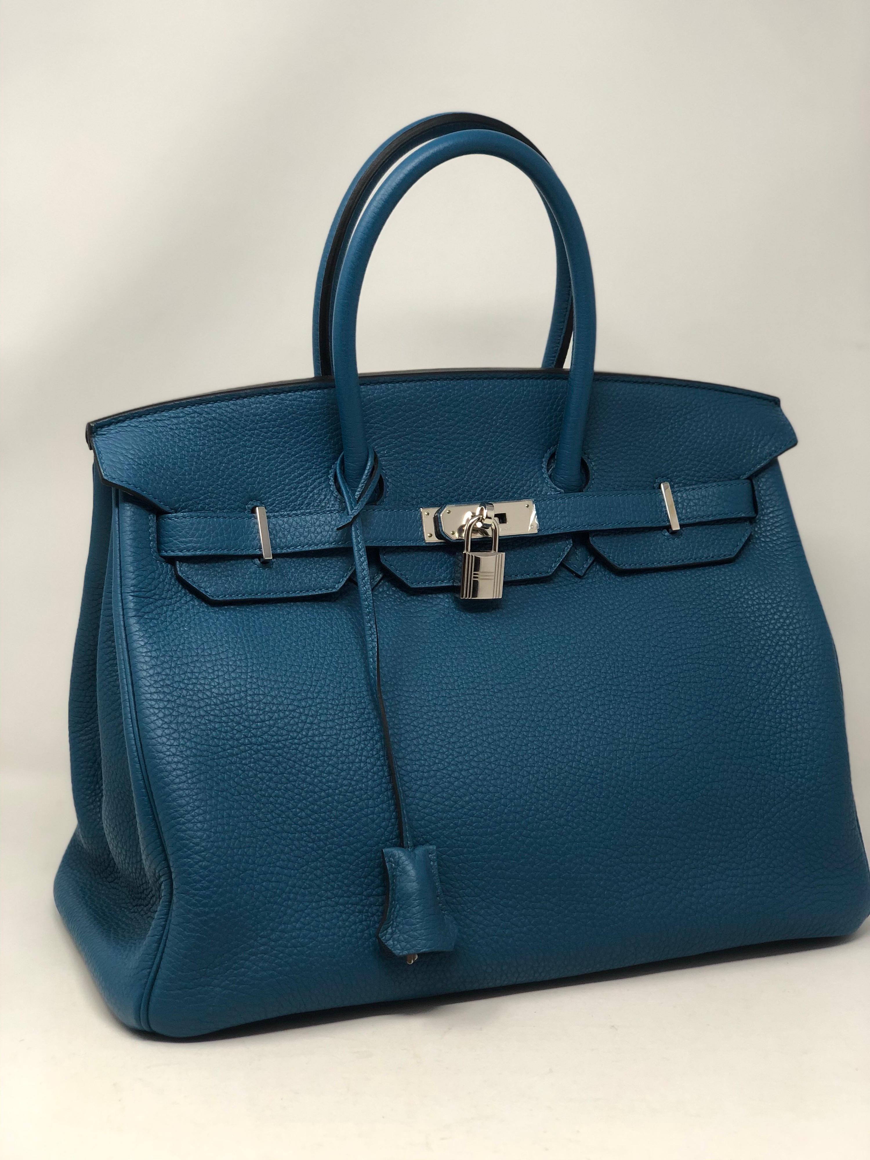 Hermes Birkin 35 Bleu Cobalt Bag. Beautiful blue color with palladium hardware. Excellent condition. P stamp from 2012. Includes clochette, lock, keys, and dust cover. Guaranteed authentic. 