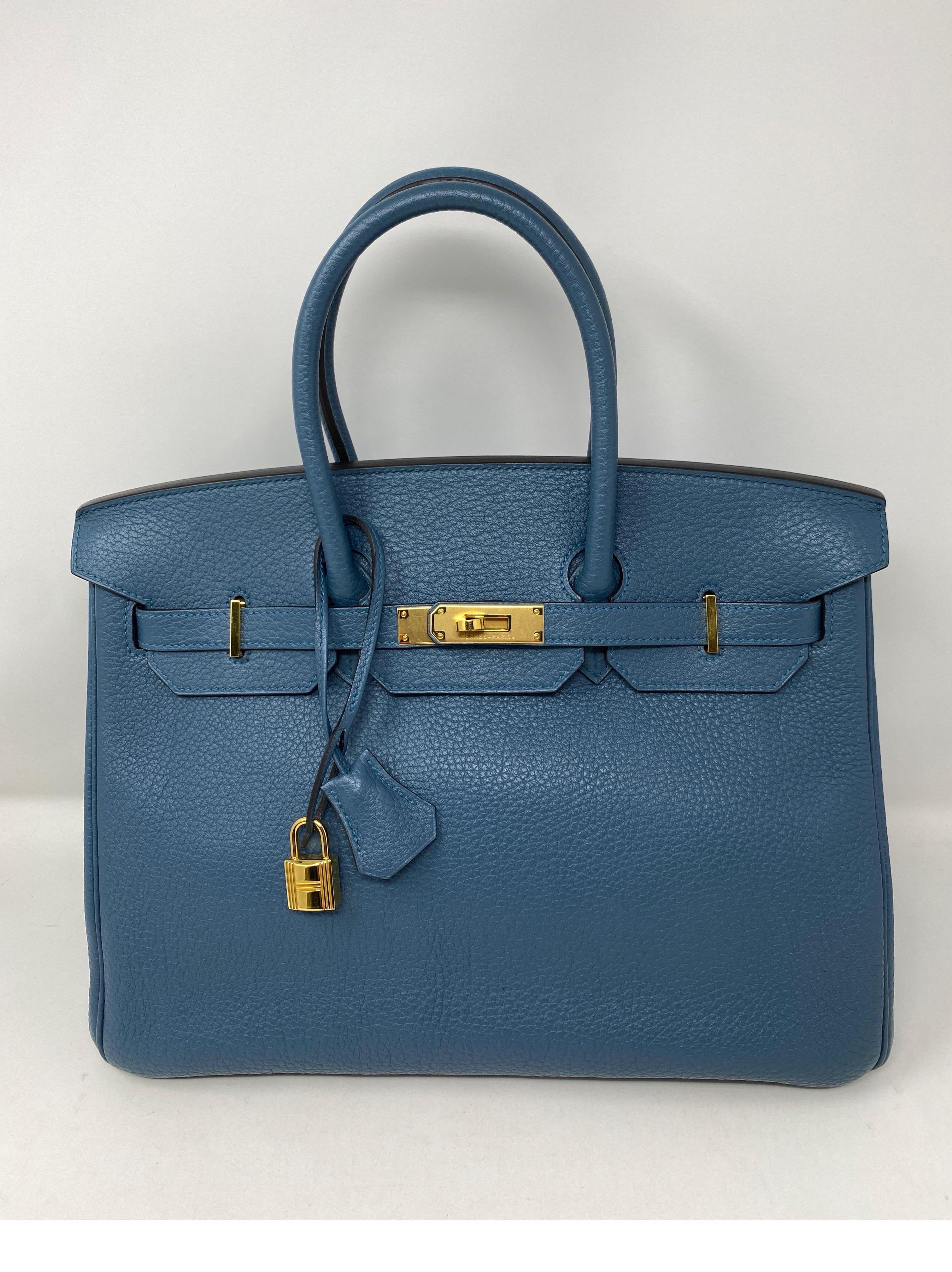 Hermes Blue Colvert Birkin Bag. Size 35. Gold hardware. Excellent like new condition. X stamp. Beautiful neutral blue color with gold. Plastic still on hardware. Great investment bag. Includes clochette, lock, keys, and dust cover. Guaranteed