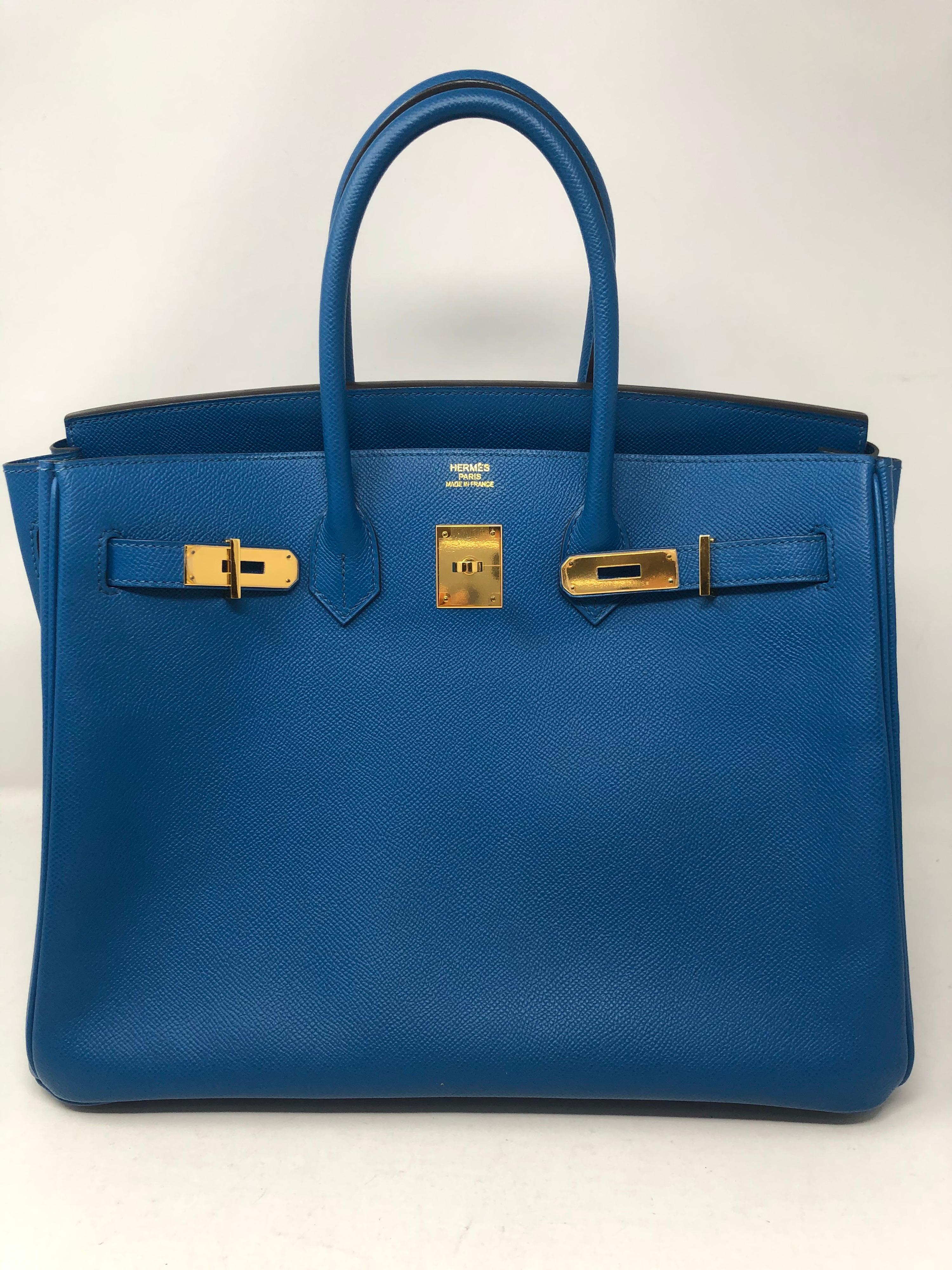 Hermes Birkin Blue Izmir 35 Bag. Gold hardware. Epsom leather. Mint condition. Looks like new. Beautiful vibrant blue color. Rare combo. Plastic is still on hardware. Includes clochette, lock, keys and dust cover. Guaranteed authentic. Don't miss