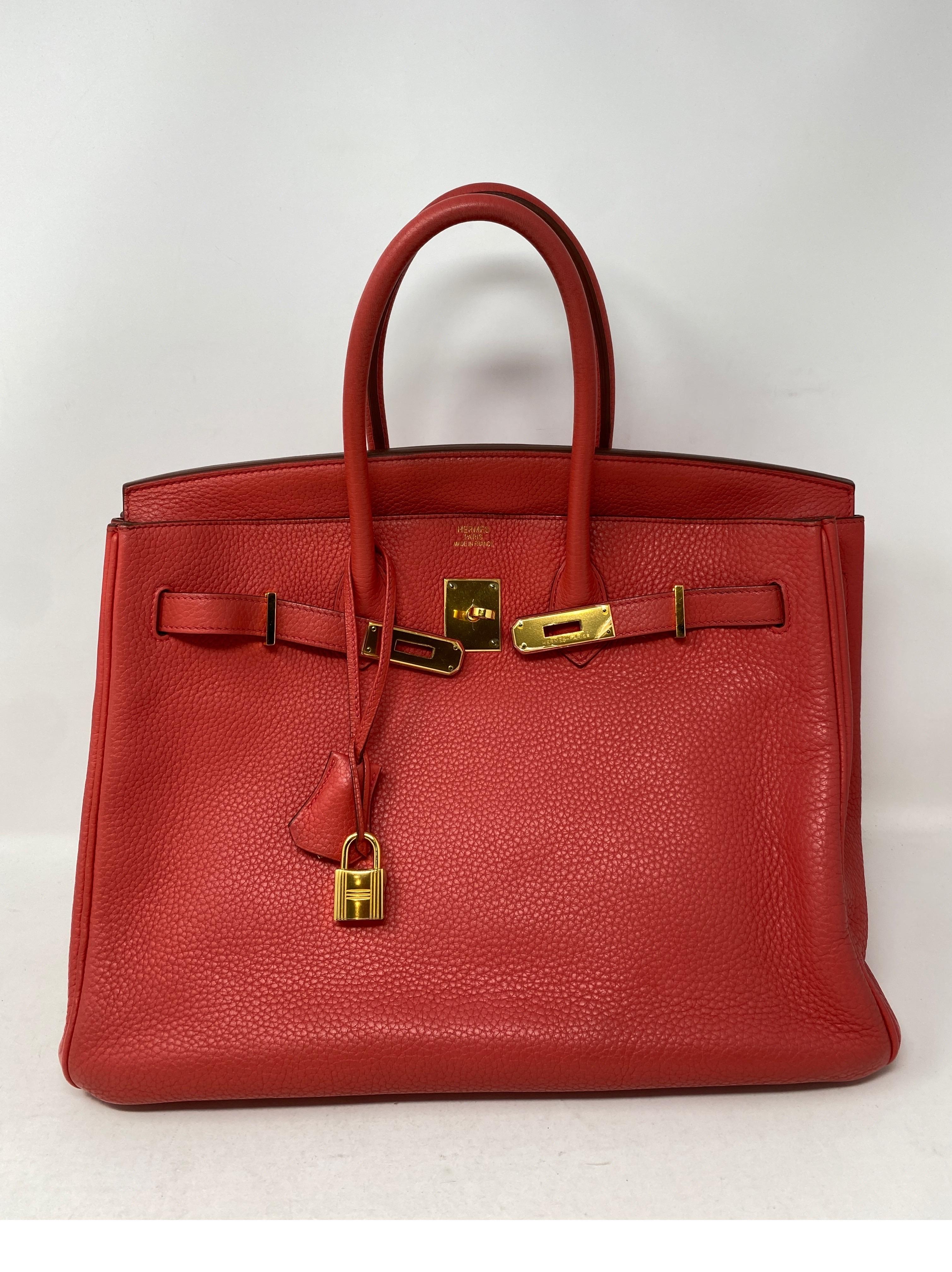 Hermes Birkin Bouganvillea Pink 35 Bag. Gold hardware. Pretty rosy pink salmon color. Good condition. Clemence leather. Includes clochette, lock, keys, and dust cover. Guaranteed authentic. 