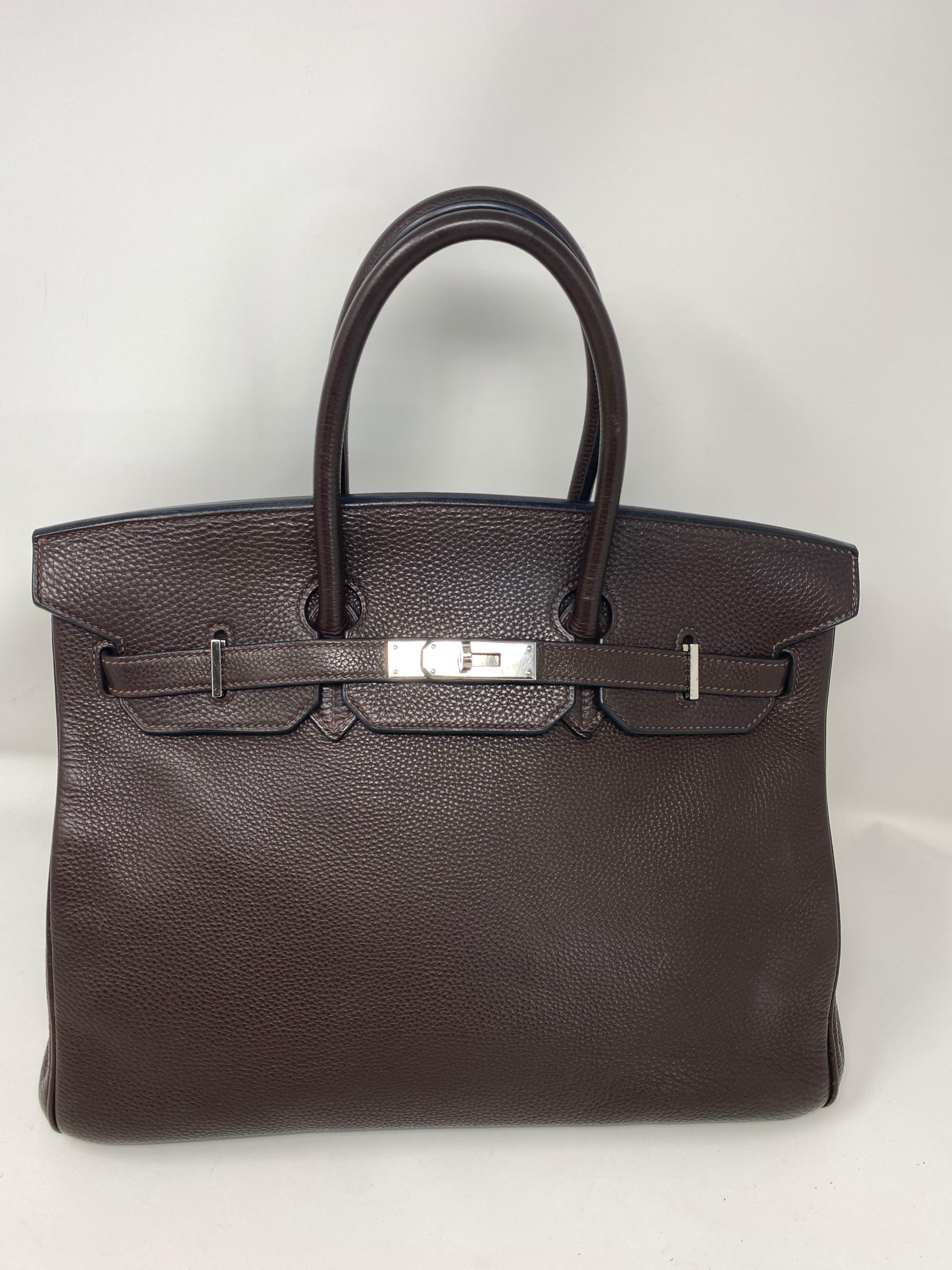 Hermes Birkin Brown 35 Togo Leather. Palladium hardware. Excellent condition. Includes clochette, keys, and lock. Hermes dust cover. Guaranteed authentic. 