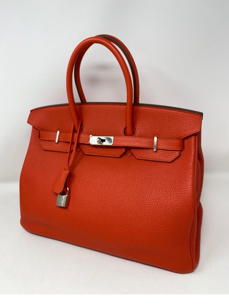 Hermes Birkin Capucine 35 Bag. Red/ orange color capucine with palladium hardware. Gorgeous poppy color. Excellent condition. Includes clochette, lock, keys, and dust cover. Guaranteed authentic. 