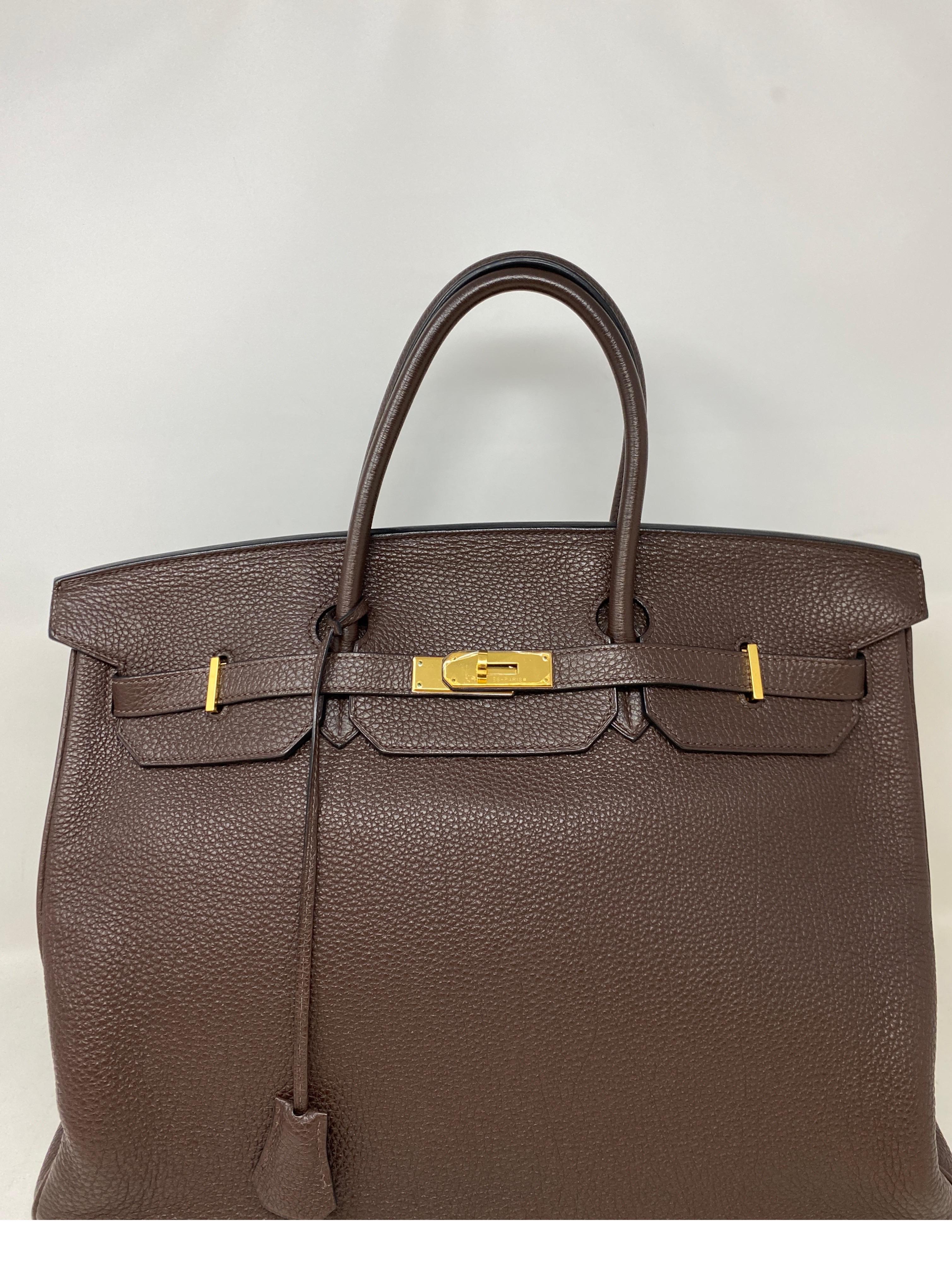 Hermes Chocolate Brown Birkin 40 Bag. Togo leather. Dark brown leather bag with gold hardware. Good condition. Hard to find biggest 40 size Birkin. Nice size bag or as a luggage piece. Great work bag. Includes clochette, lock, keys, and dust bag.