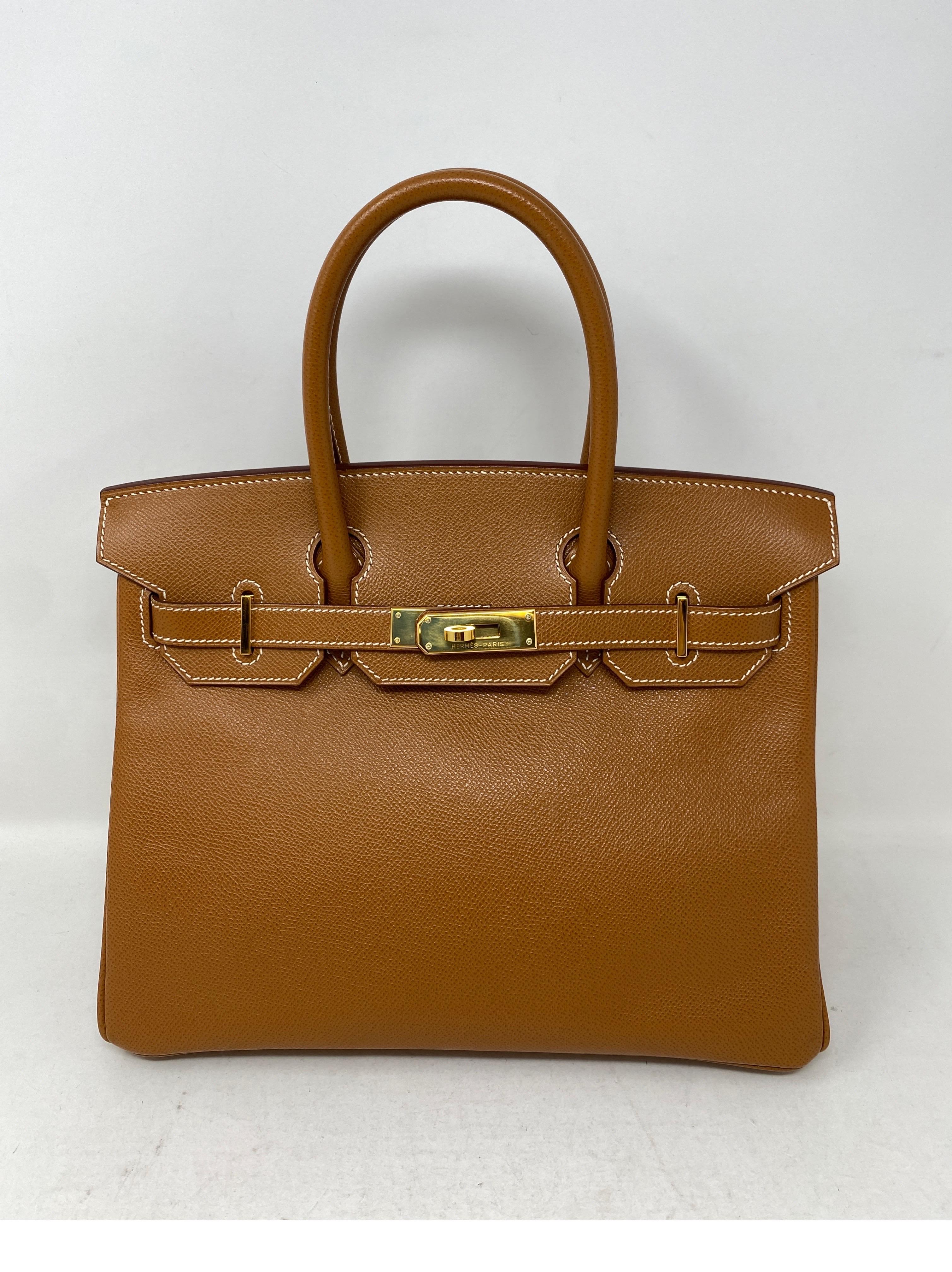 Hermes Gold Birkin 30 Bag. Gold hardware. Hard to find gold on gold combination. Epsom leather. Stunning bag. Amazing structure. Small white spot inside interior. Exterior look like new. Includes clochette, lock, keys, and dust cover. Guaranteed