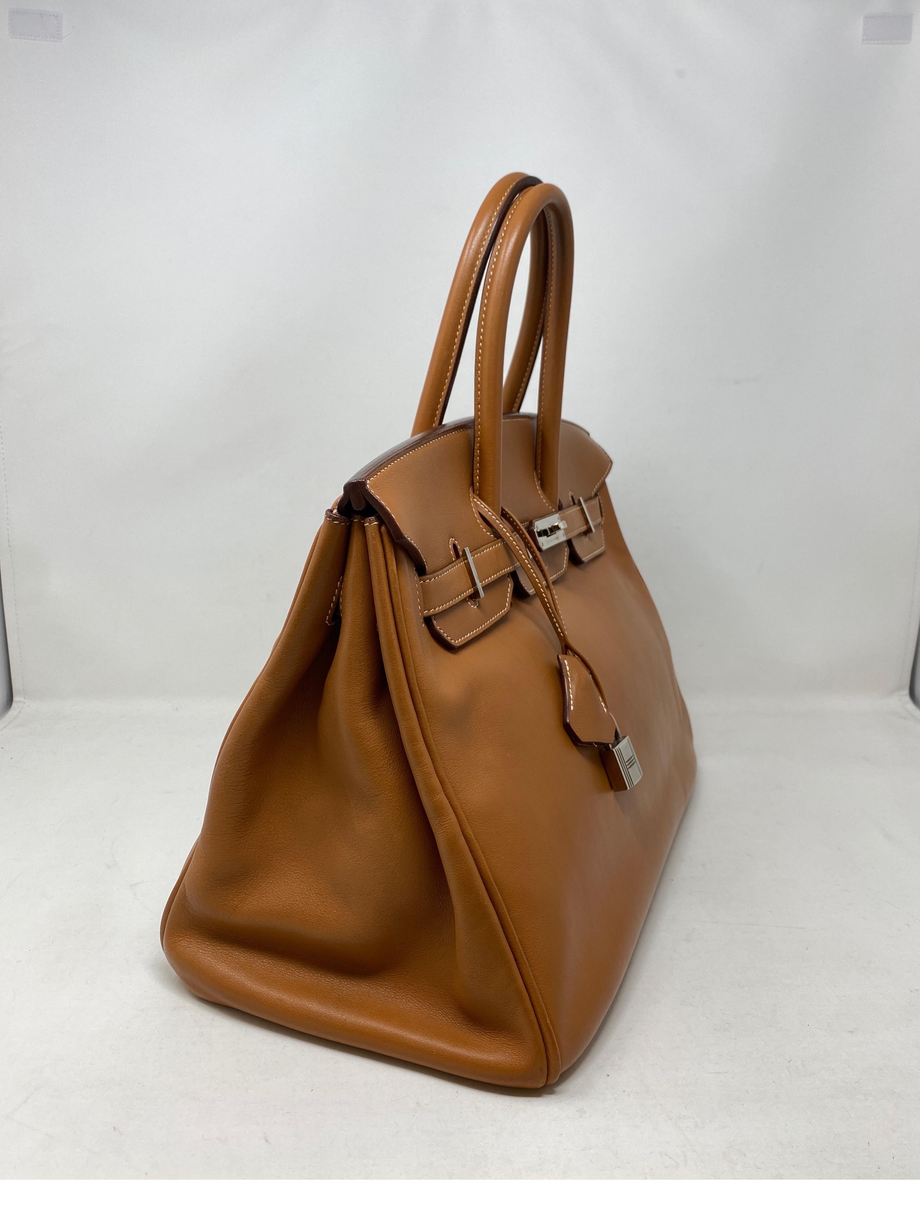 Hermes Gold Birkin Bag. Palladium hardware. Swift leather. Lovely vintage Birkin bag in good condition. Smooth swift leather. Gets better with age. The most wanted neutral color gold tan leather. Includes clochette, lock, keys, and dust cover.