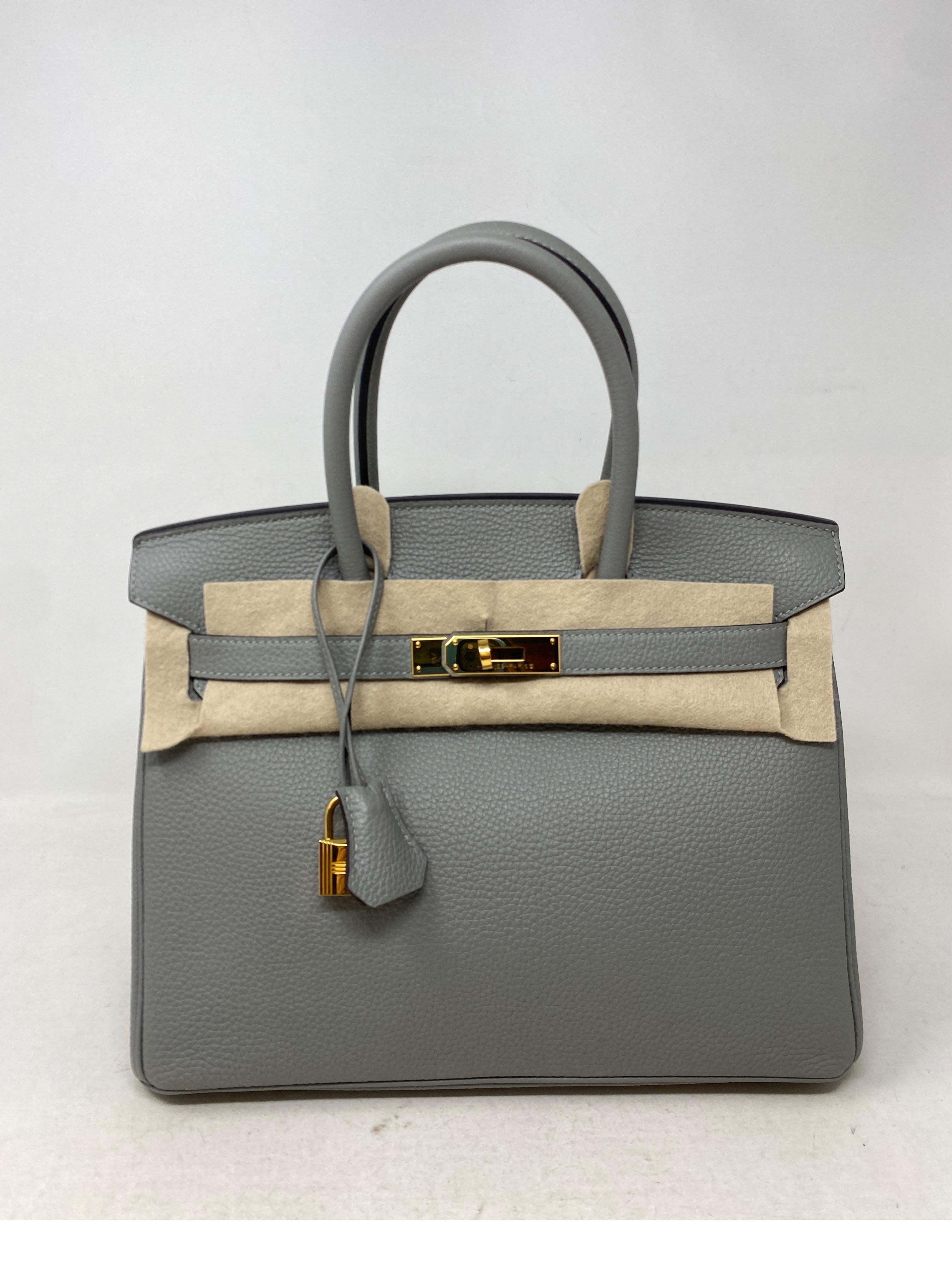 Hermes Gris Mouette Birkin 30 Bag. Light bluish gray leather with gold hardware. Rare color and in excellent condition. Looks like new. Kept in dust bag. Stunning color. Gift worthy. Includes clochette, lock, keys, and dust bag. Guaranteed