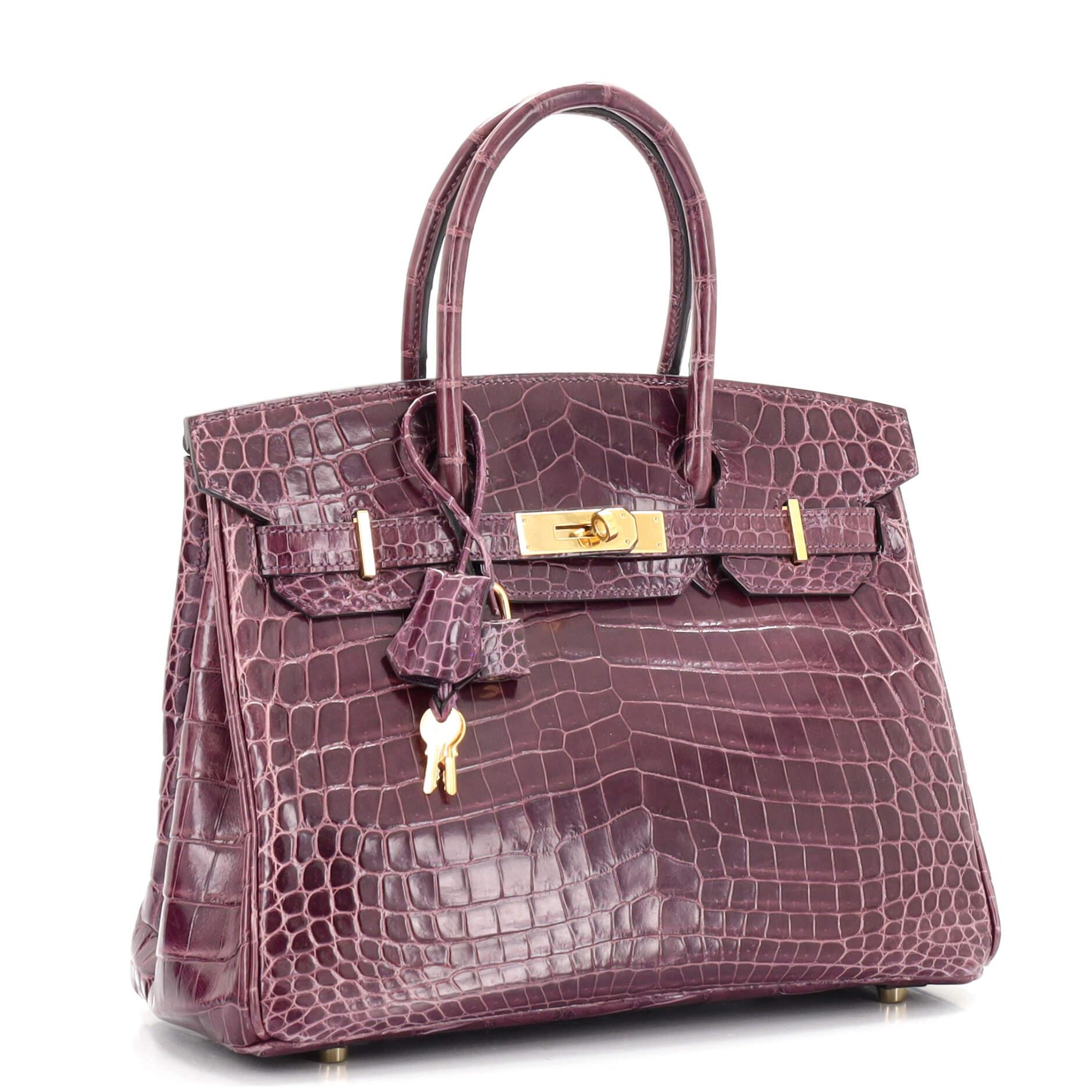 This item can only be shipped within the United States.

Condition: Good. Odor in interior. Moderate wear on base corners, wear, creasing and scuffs on exterior, discoloration on exterior edges and handles. Splitting handle, flap opening corner,