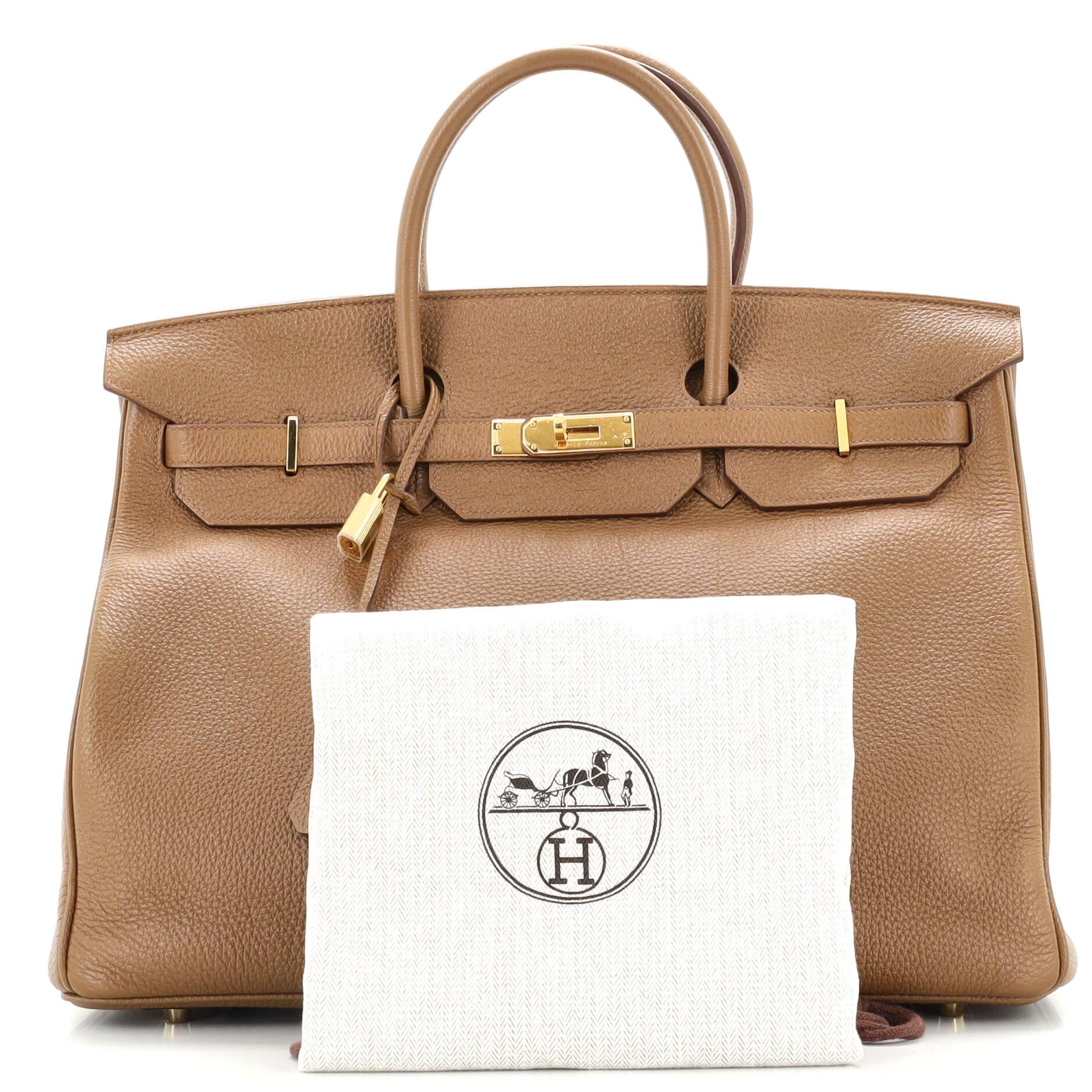 Condition: Marketplace Only. Repainted exterior and handles. Creasing on exterior, minor wear on base corners and handles. Cracking on flap opening corner wax edges, slight splitting on side opening and belt closure wax edges, scratches and