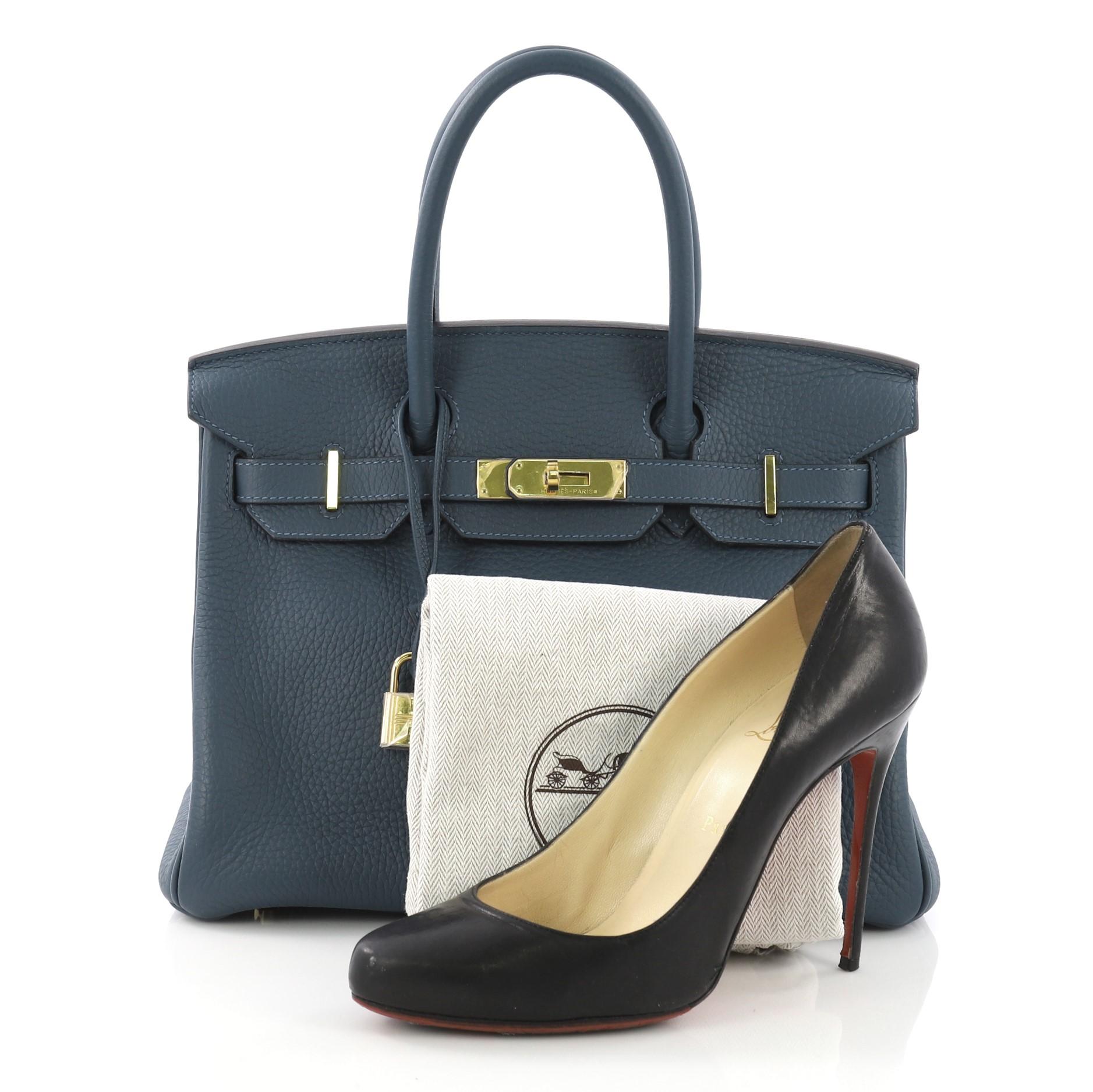 This Hermes Birkin Handbag Colvert Clemence with Gold Hardware 30, crafted in Colvert blue Clemence leather, features dual rolled handles, front flap, and gold hardware. Its turn-lock closure opens to a Colvert blue Chevre leather interior with slip
