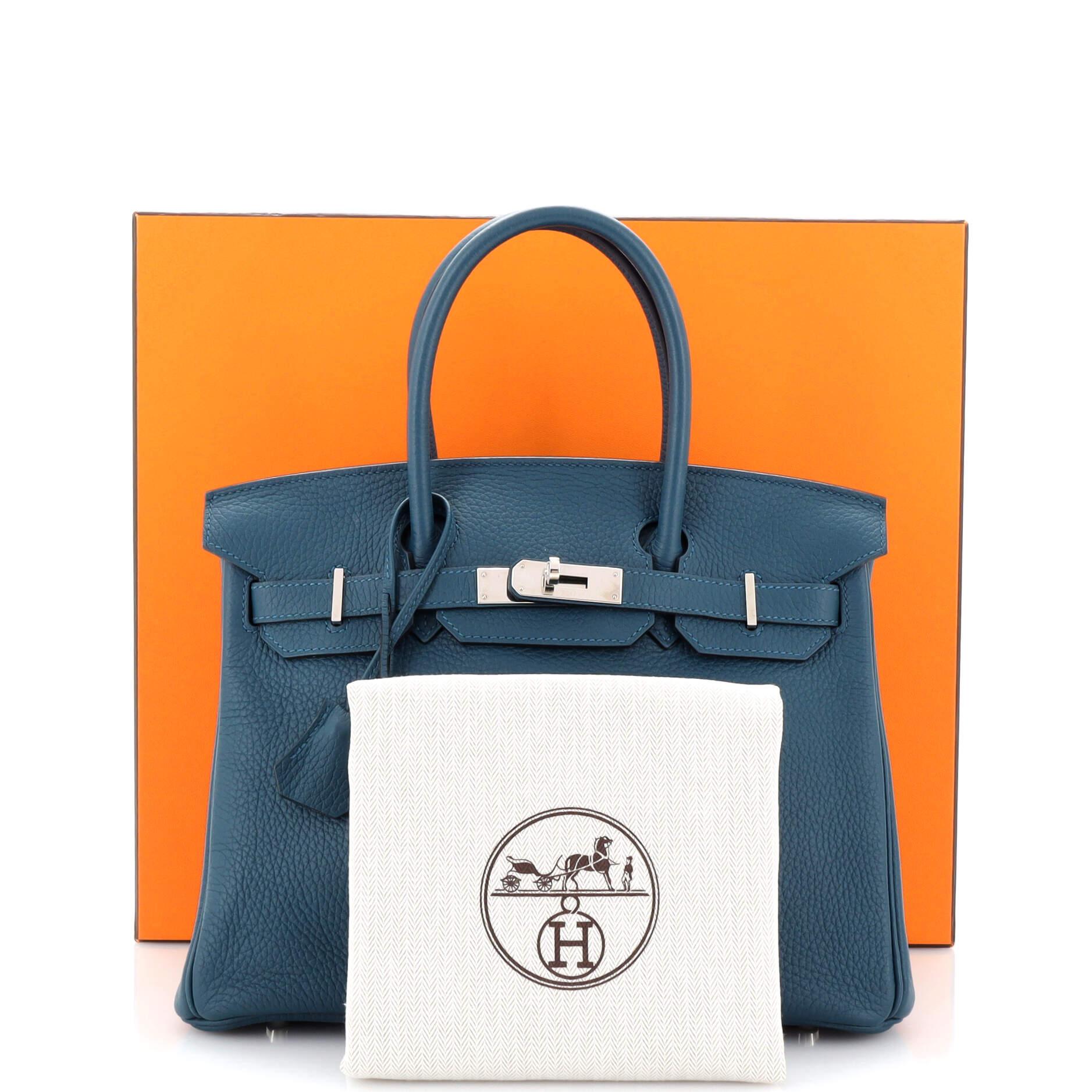 Condition: Very good. Creasing on exterior, small nick on rear base corners, light wear on front handle wax edges. Indentations and scuffs on interior base, minor wear in interior, scratches on hardware.
Accessories: Box, Keys, Clochette, Lock, Dust