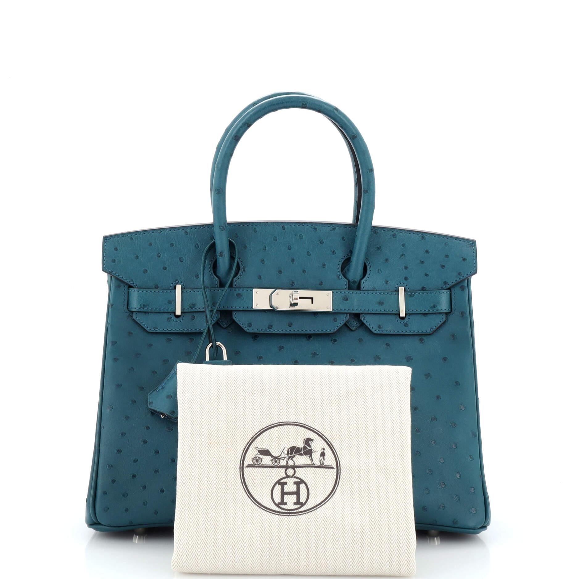 This item can only be shipped within the United States.

Condition: Excellent. Light scuffs and creasing on exterior, scratches on hardware.
Accessories: Keys, Dust Bag, Lock, Clochette
Measurements: Height 9