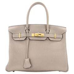 Sac à main Hermès Birkin gris Togo avec finitions métalliques dorées 30