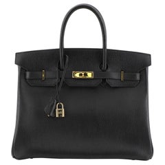 Hermes Birkin Handbag Noir Ardennes with Gold Hardware 35, crafted in Noir black