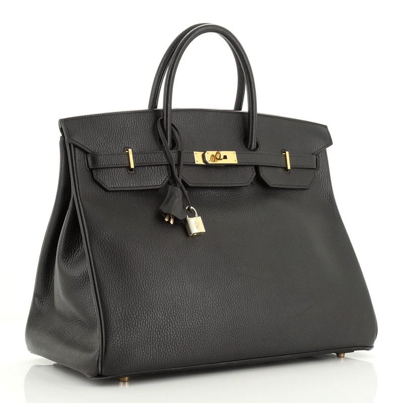 Condition: Good. Heavy wear on base corners, minor scuffs and creasing on exterior. Slight cracking on handle wax edges, scuffs and indentations on interior base, scratches on hardware. 
Accessories: Keys, Lock, Clochette 
Measurements: Handle Drop