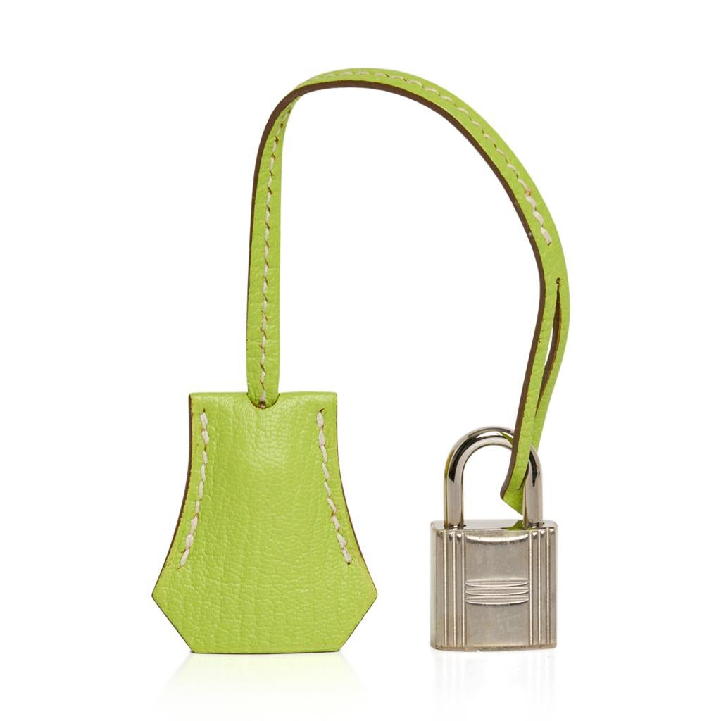 Guaranteed authentic Hermes Birkin HSS 25 bag featured in fresh Lime and Kiwi. 
This special order Hermes Birkin bag is a drop of sunshine on your arm!
Fresh with palladium hardware.
Comes with lock, keys, clochette, sleepers, raincoat, signature