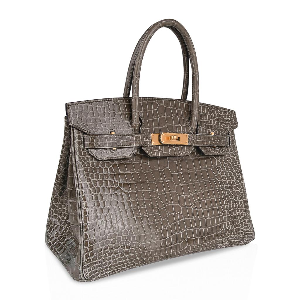 Mightychic offers an Hermes Birkin HSS 30 bag featured in limited edition coveted Gris Tourterelle.
This special order Hermes bag in Porosus crocodile creates a beautiful colour which is a perfect 
neutral for perfect for year round wear.
Extremely