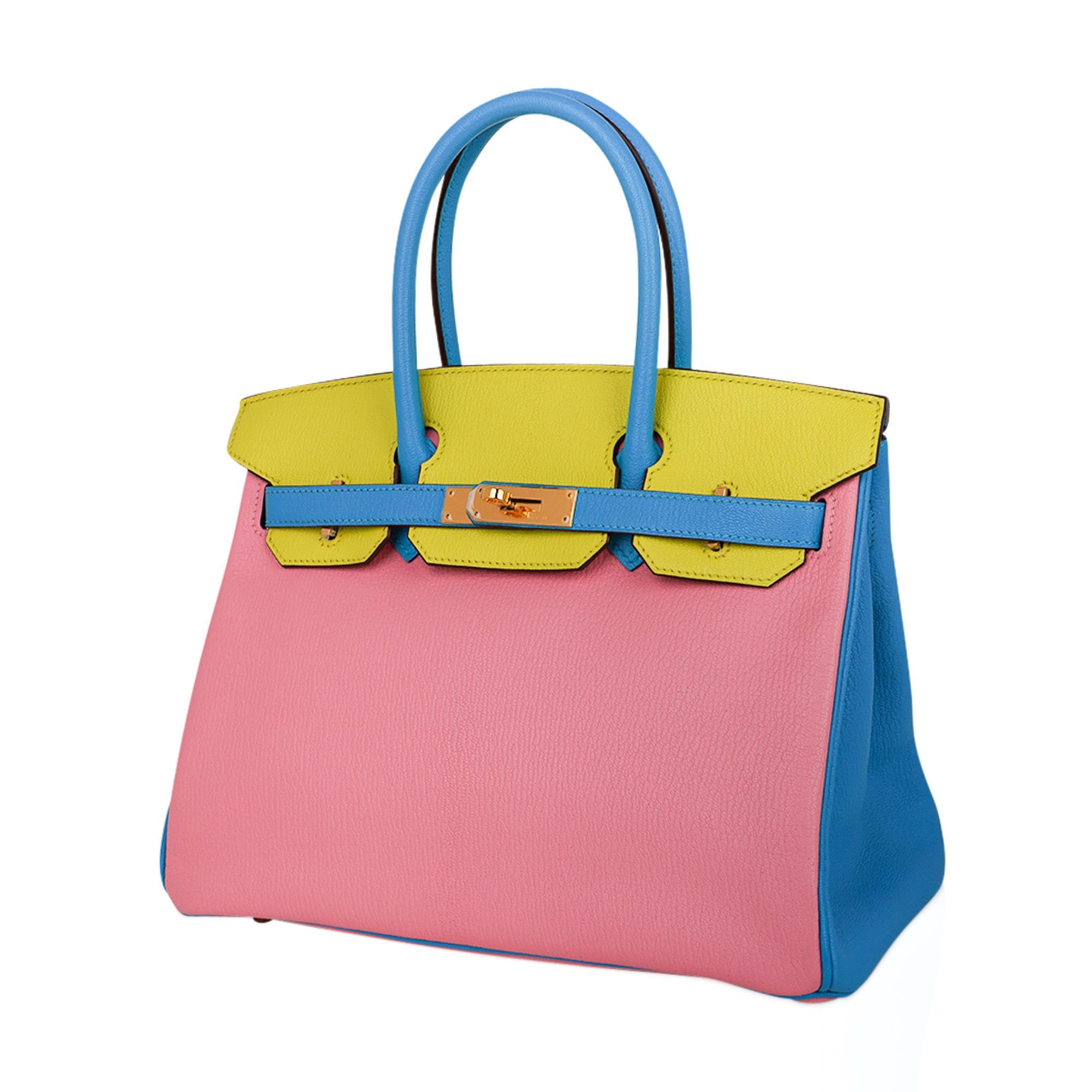 Mightychic offers an tri-color Hermes Birkin HSS 30 featured in Rose Confetti, Blue Aztec and Soufre.
This gorgeous combination is a dream!
Presented in coveted and rare to find Chevre leather.
Lush with gold Birkin bag hardware.
Comes with the lock