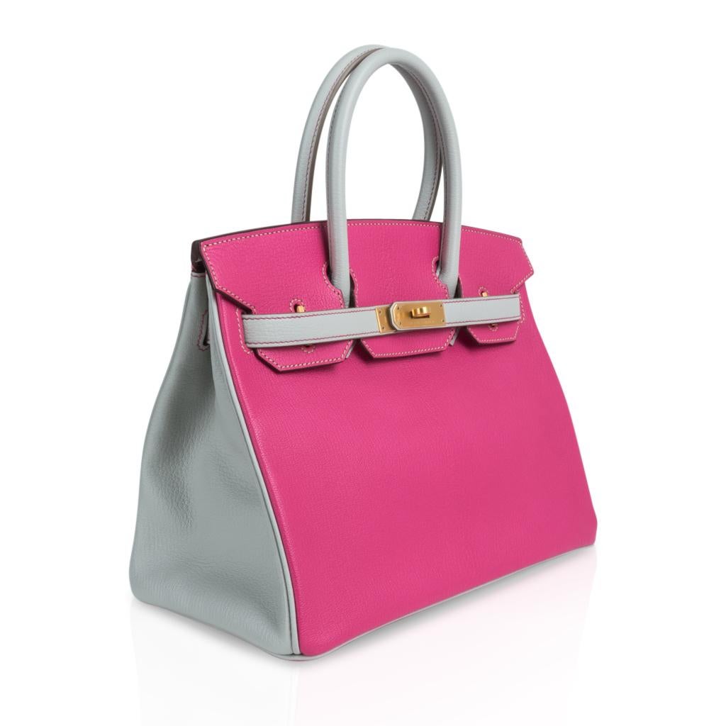 Mightychic offers an Hermes Birkin HSS 30 bag featured in coveted rare Rose Shocking and Gris Perle.
Vivid pop all grown up pink with clear Gris Perle in coveted Chevre leather.
This stunning special order Hermes Birkin bag is accentuated with