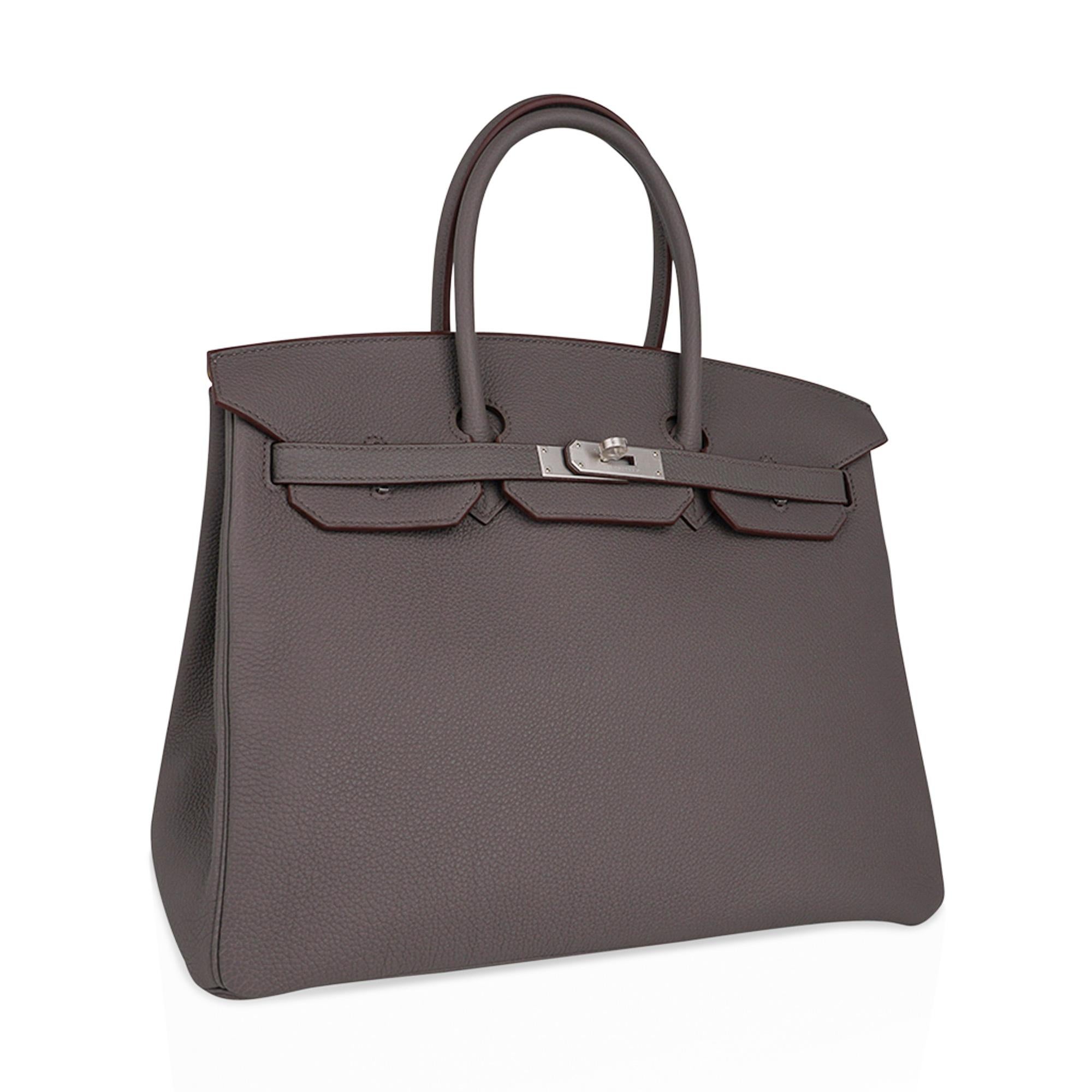 Mightychic offers a rare Hermes Birkin HSS 35 bag featured in Etain with Lime interior. 
Etain is the most perfect medium gray and is utterly neutral.
Subtle brushed palladium hardware.
Togo leather  is textured and scratch resistant.
This beautiful