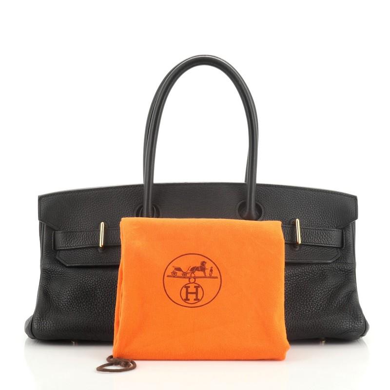 This Hermes Birkin JPG Handbag Noir Clemence with Gold Hardware 42 crafted in Noir black Clemence leather, features dual rolled handles, frontal flap, and gold hardware. Its turn-lock closure opens to a Noir black Chevre leather interior with side