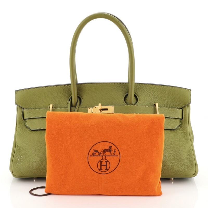 This Hermes Birkin JPG Handbag Vert Chartreuse Clemence with Gold Hardware 42, crafted in Vert Chartreuse green Clemence leather, features dual rolled top handles, frontal flap, and gold hardware. Its turn-lock closure opens to a Vert Chartreuse