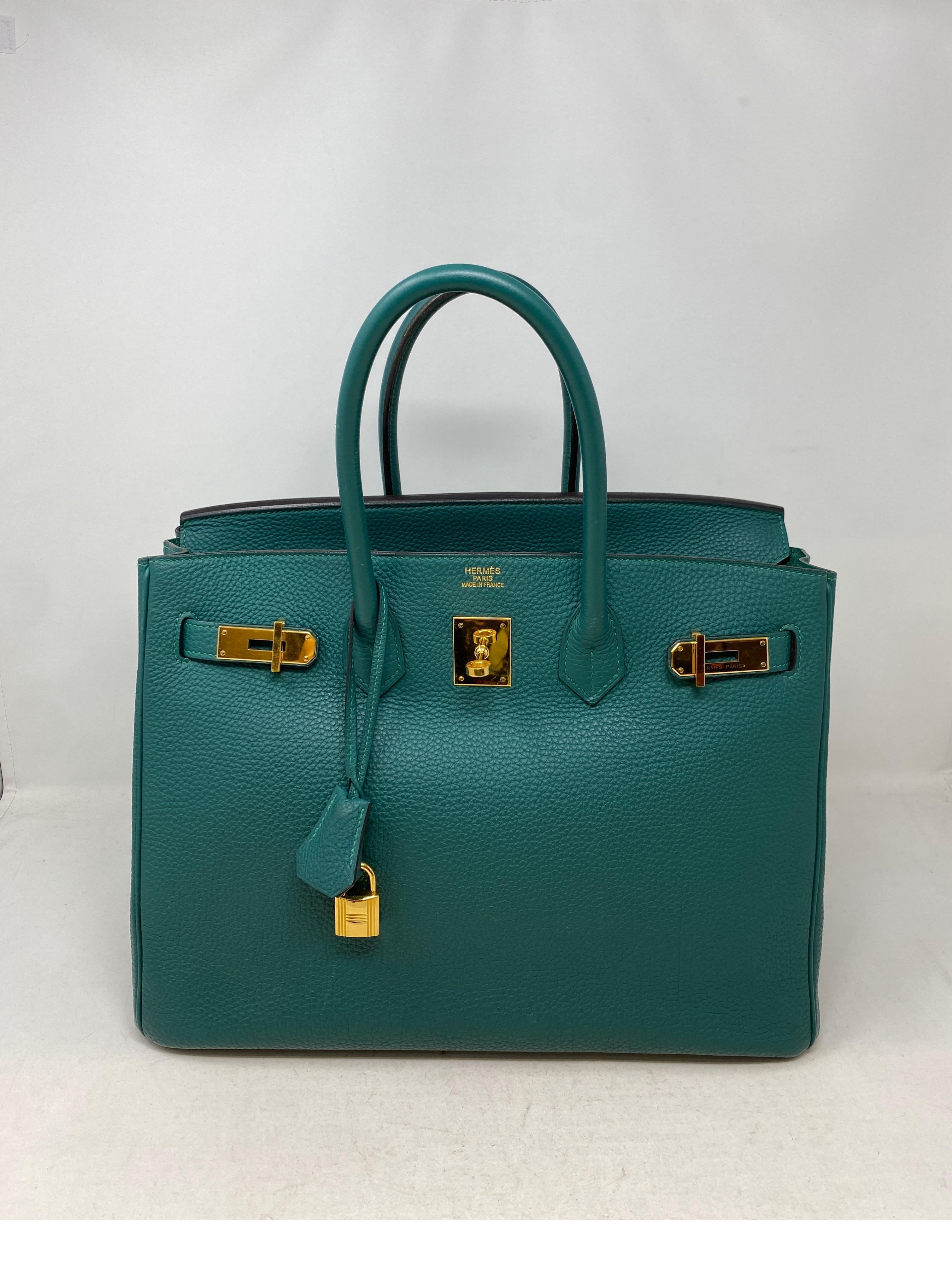 Hermes Malachite Birkin 35 Bag. Rare green color with gold hardware. Mint like new condition. Gold hardware. Togo leather. Includes clochette, lock, keys, and dust cover. Guaranteed authentic. 