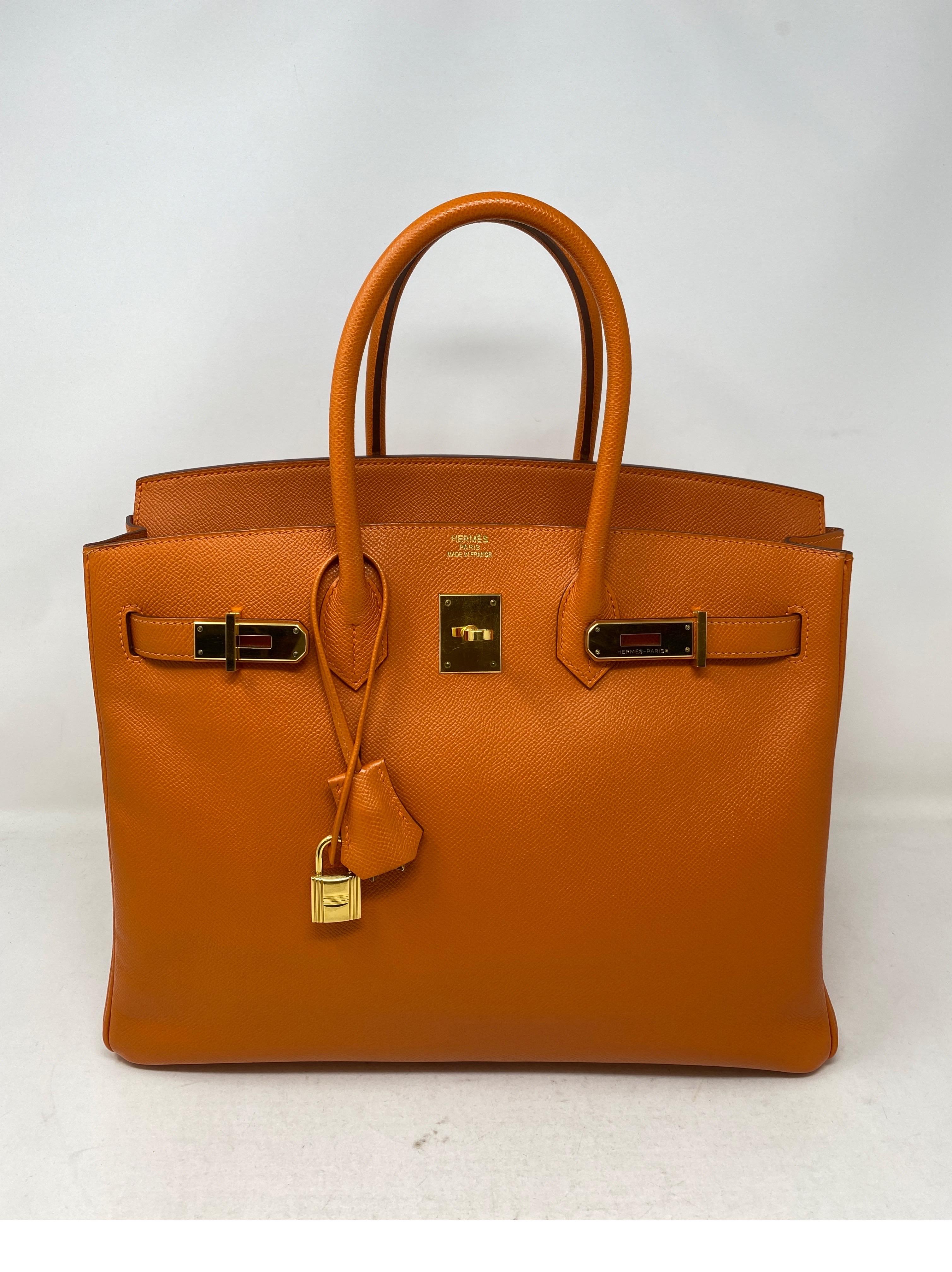 Hermes Orange Birkin 35 Bag. Gold hardware. Excellent condition. Looks like new. Epsom leather. Most wanted orange and gold combination. Gorgeous bag. Includes clochette, lock, keys, and dust cover. Guaranteed authentic. 
