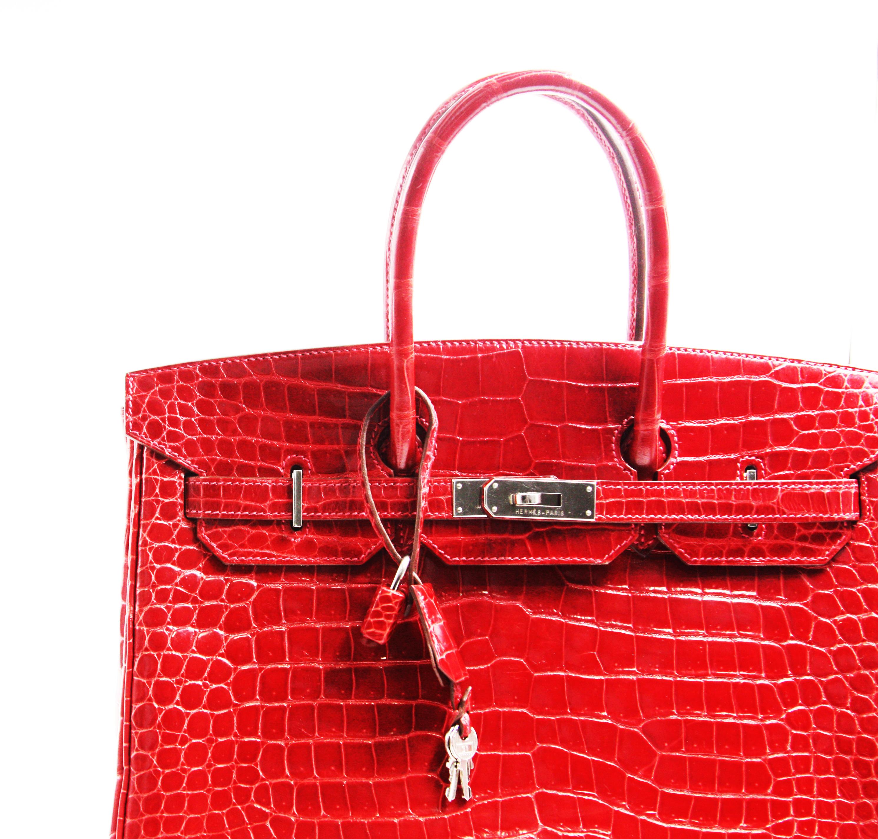 Hermes
Birkin 35  
Hermès Birkin Red Crocodile Porosus Skin Leather Tote
Size 13.78* 7.28 * 11.0in

