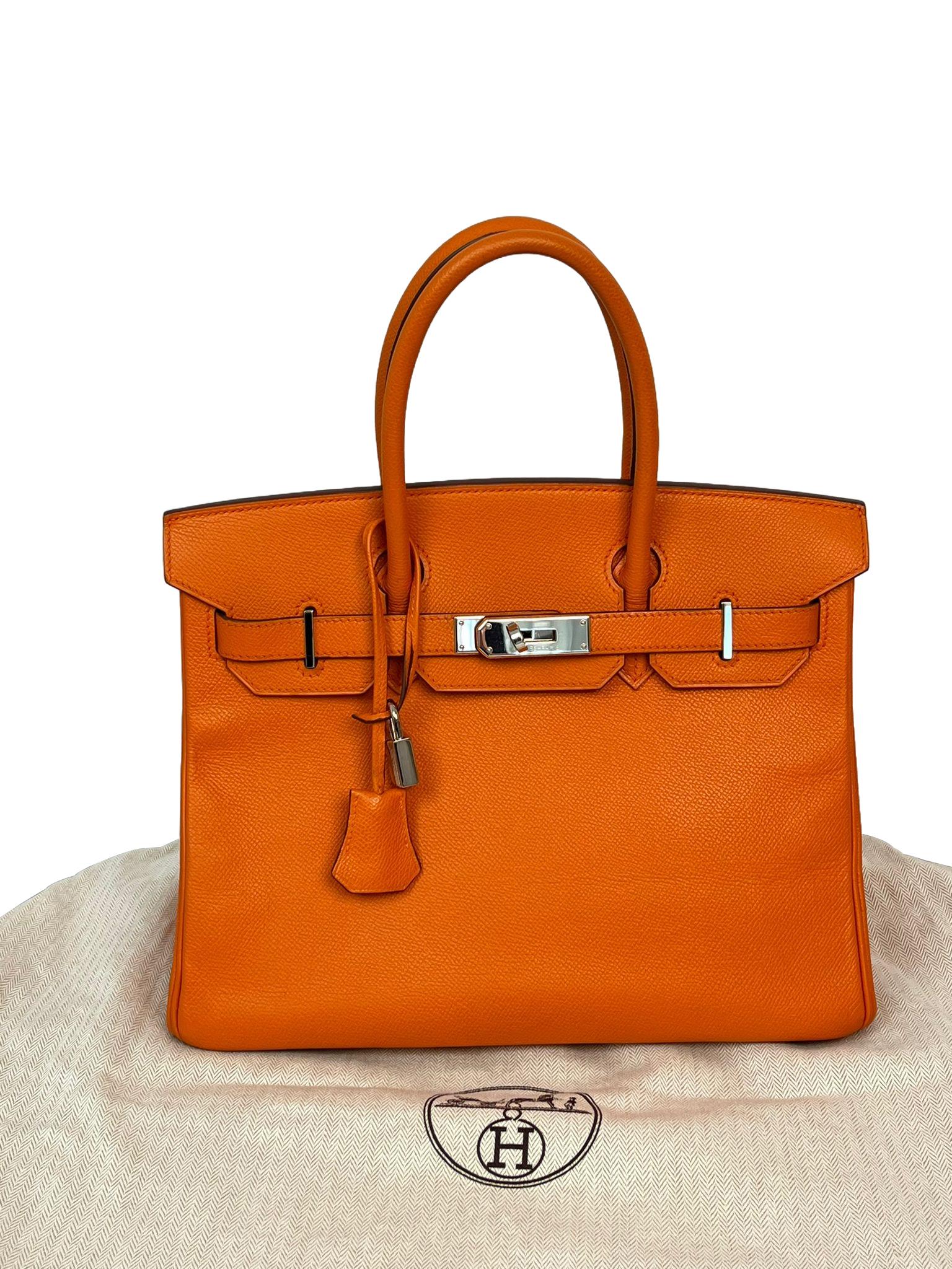 This Birkin is in Orange Swift leather, Elevate your style with this Hermes bag. Merging form and function, this exquisite accessory epitomizes sophistication, ensuring you stand out with elegance and practicality by your side. This Birkin bag (