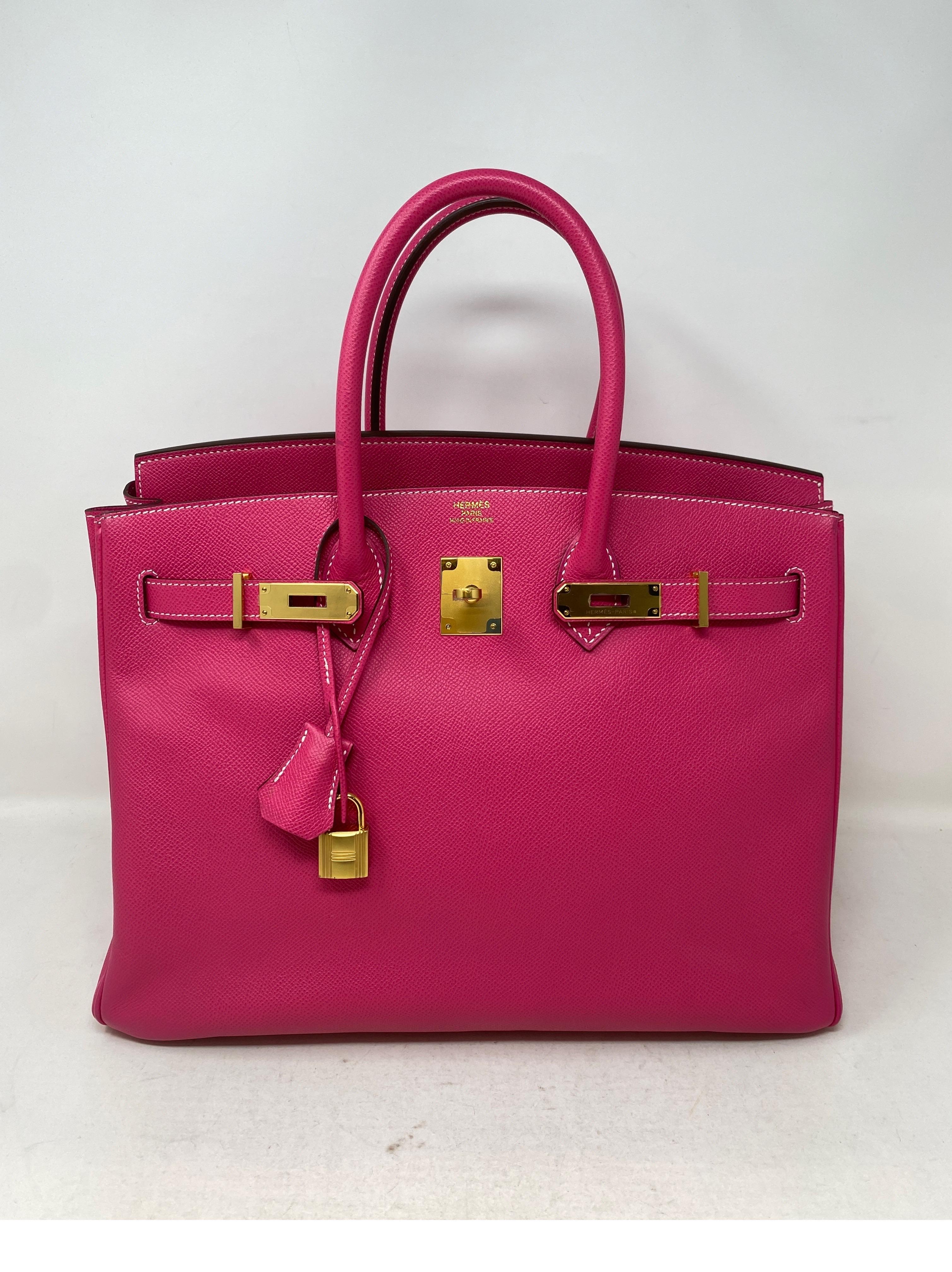 Hermes Rose Tyrien Pink Birkin 35 Bag. Stunning hot pink color bag with gold hardware. Excellent like new condition. Still has plastic on hardware. Epsom leather. Beautiful bag. Includes clochette, lock, keys and dust cover. Guaranteed authentic. 