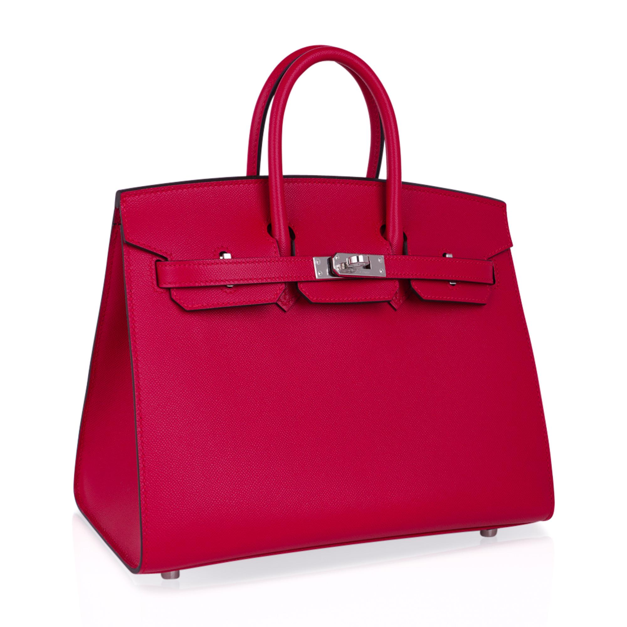 Mightychic offers an Hermes Birkin Sellier 25 bag featured in vibrant Framboise.
Hermes Framboise is a rich, saturated raspberry pink which is gorgeous for year round wear.
This limited edition bag is now retired and is sure to become a collectors
