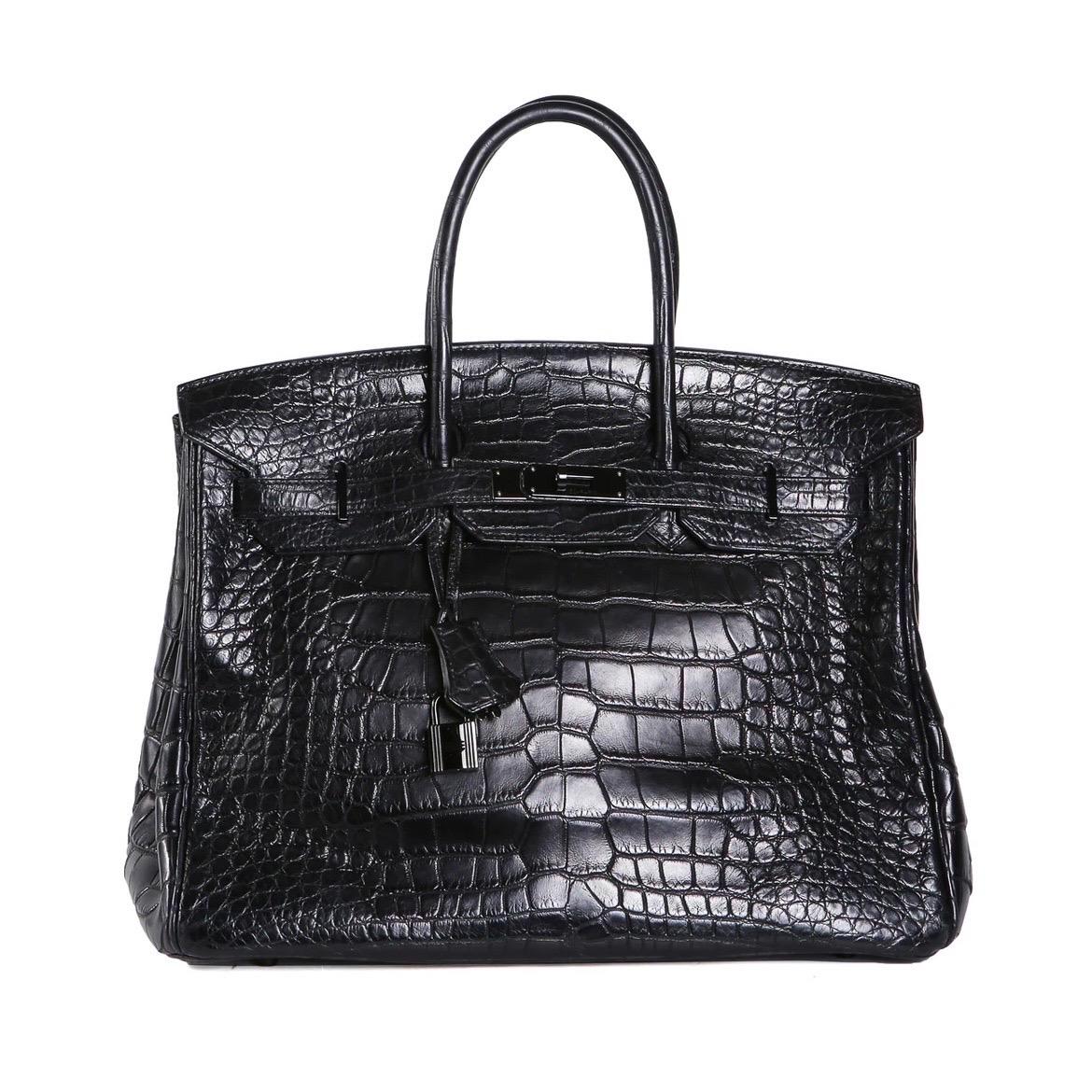 Birkin bag by Hermes from 2011
Only 3 others produced
Black crocodile leather with shiny gunmetal hardware
Lock and key included
Dimensions:  14