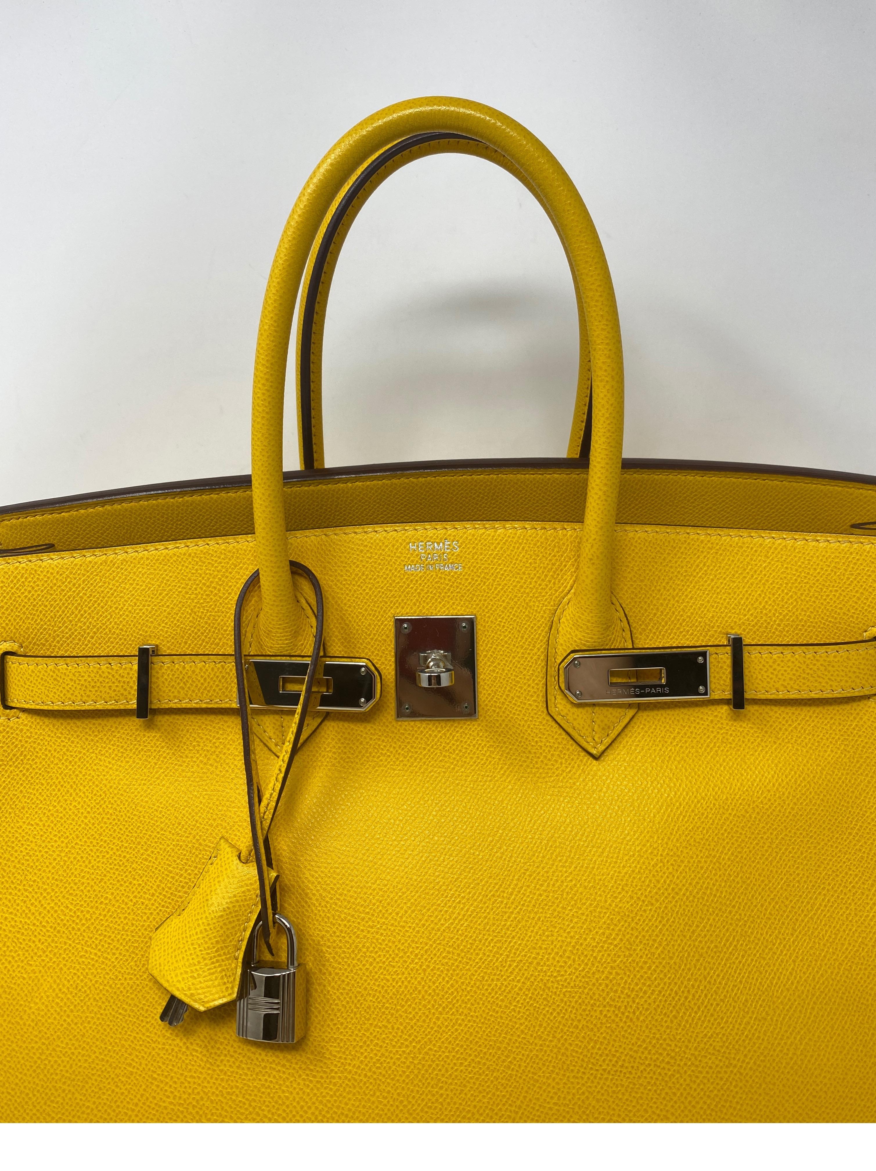 Hermes Birkin Jaune Yellow 35 Bag. Palladium hardware. Epsom leather. Mint condition. Like new condition. Beautiful bright yellow color. From 2005. Includes clochette, lock, keys, and dust cover. Guaranteed authentic. 