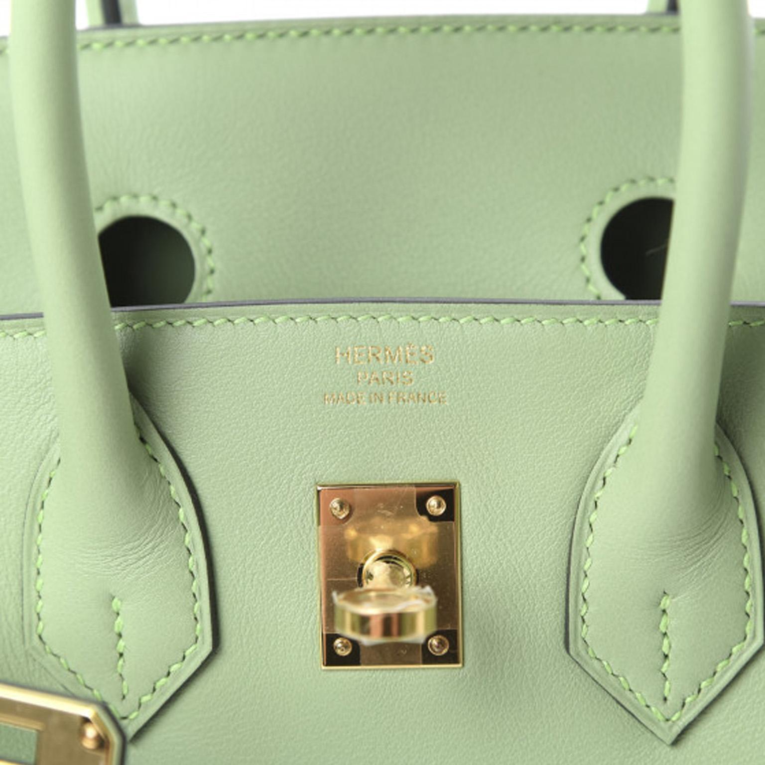 This 25cm Hermes Birkin is featured in a stunning Vert Criquet colour and accented with Gold hardware. Made from soft Swift leather, a fine grain that shimmers in sunlight, this Birkin is a true testament to the quality of the house's craftmanship.