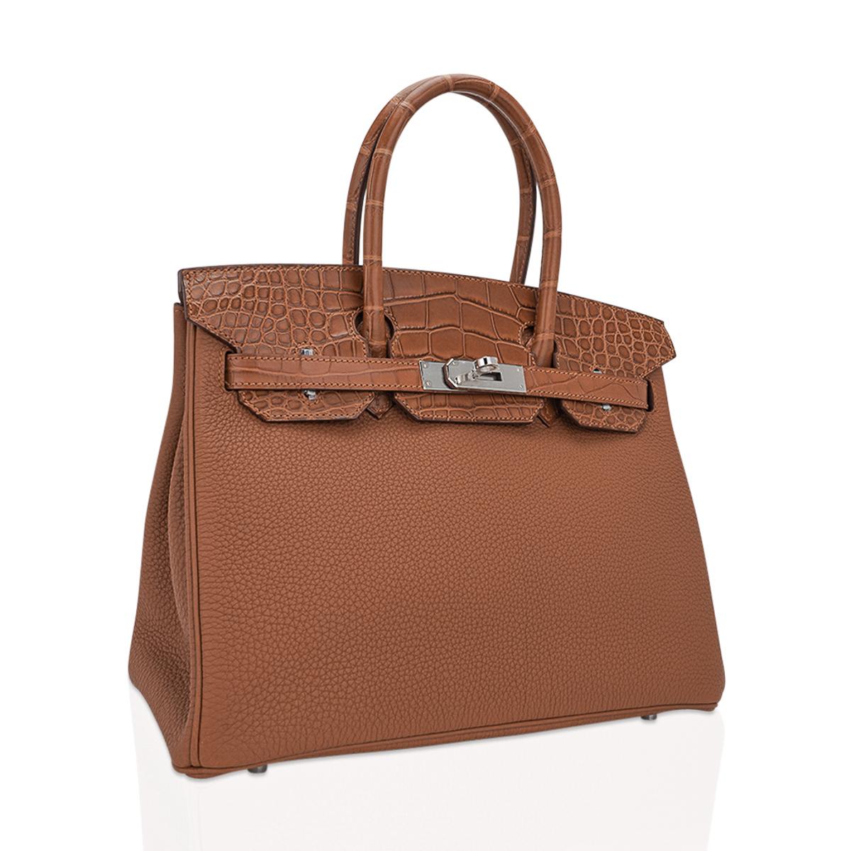 Mightychic offers a limited edition Hermes Birkin 30 Touch limited edition bag featured Matte Gold Alligator and Togo leather.
This beautiful neutral bag is perfection!
Crisp with palladium hardware.
This beauty will take you year round.
NEW or