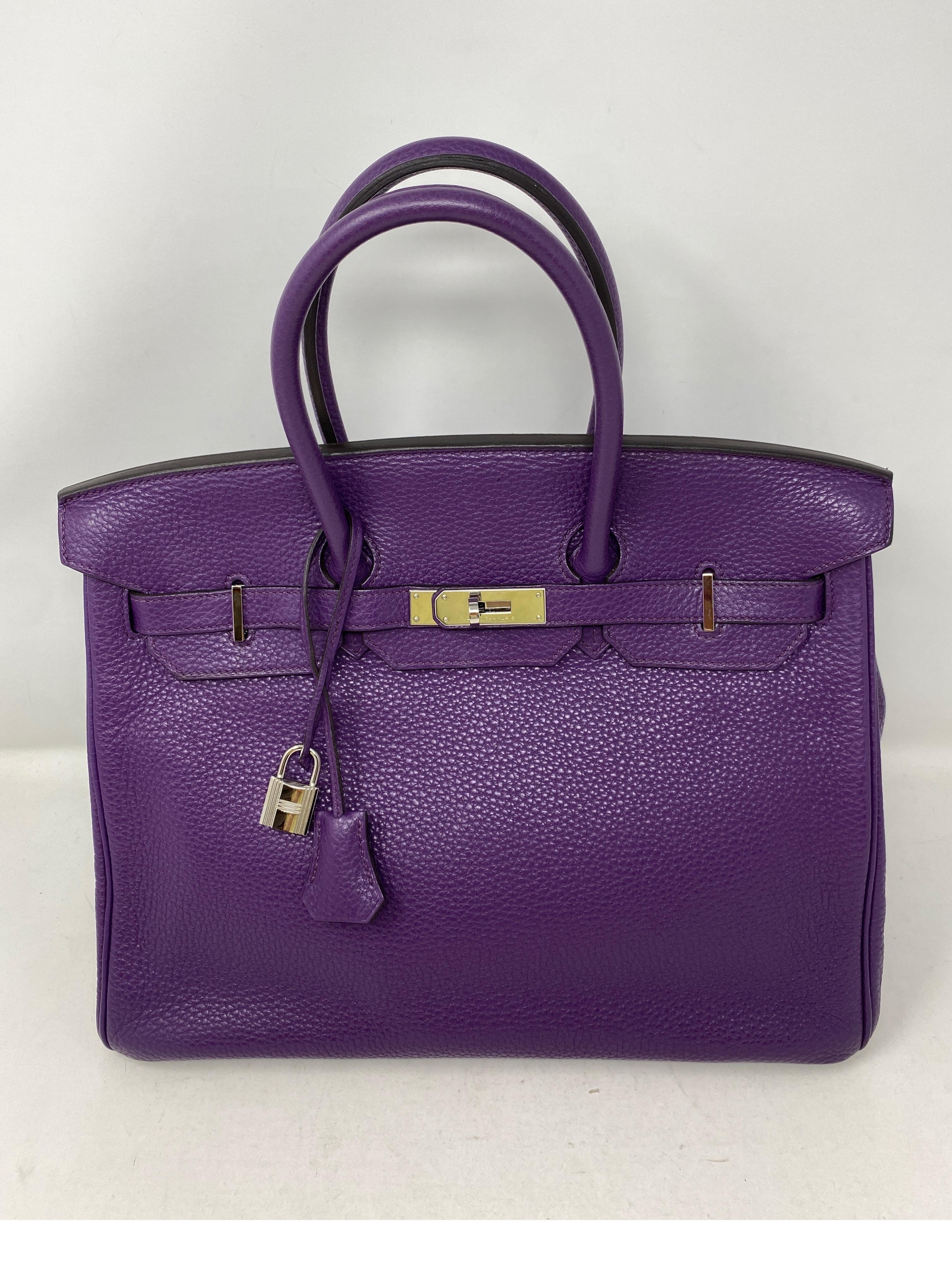 Hermes Ultraviolet Birkin 35 Bag. Palladium hardware. From 2012. P stamp. Excellent condition. Still has plastic on hardware. Vibrant purple color. Includes clochette, lock, keys, rain jacket and dust cover. Includes authenticity certificate.